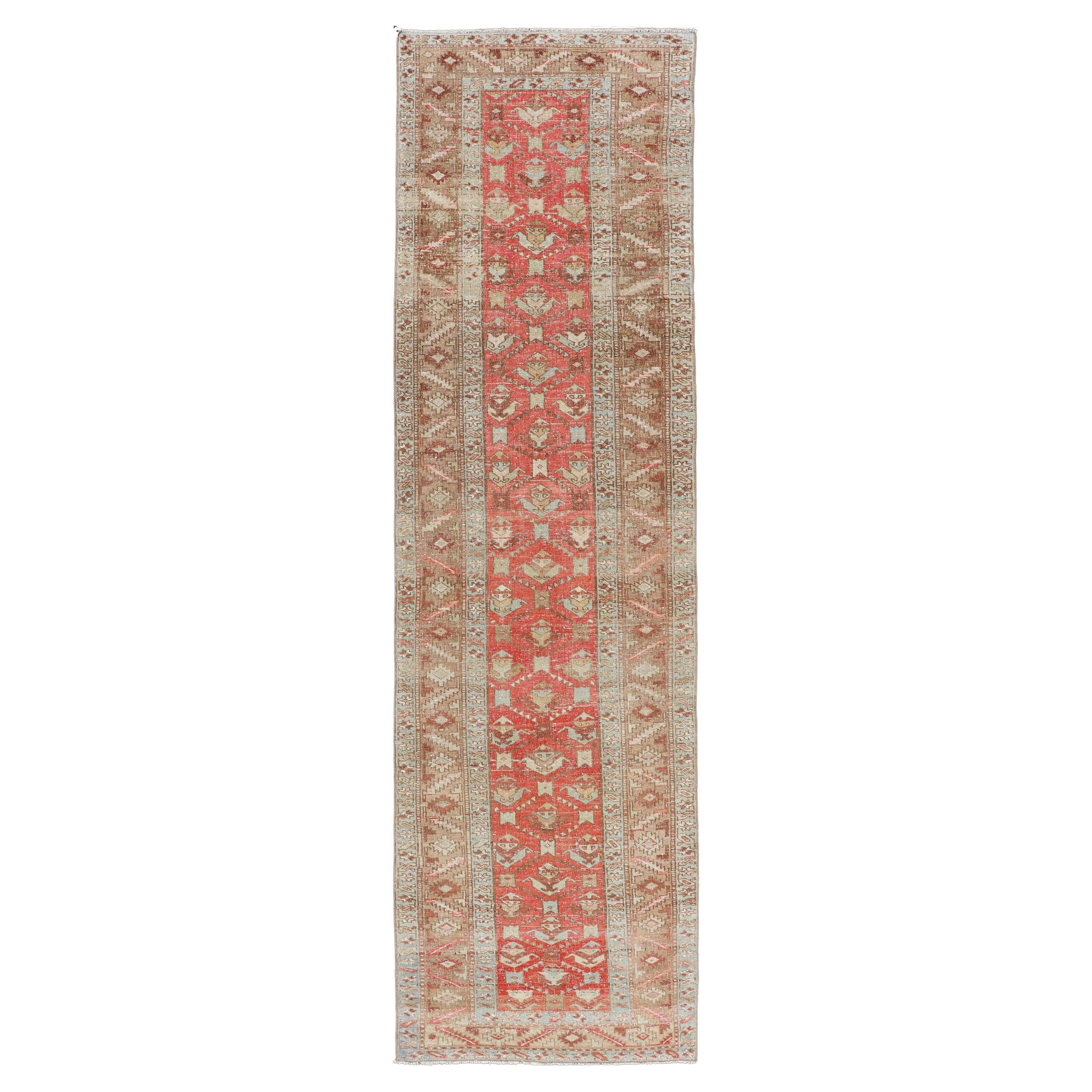 Persian Antique Heriz Runner With All-Over Geometric Design On A Red Field  For Sale