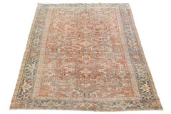 Tappeto persiano antico in lana di Heriz con un disegno a tutto tondo con campo color ruggine