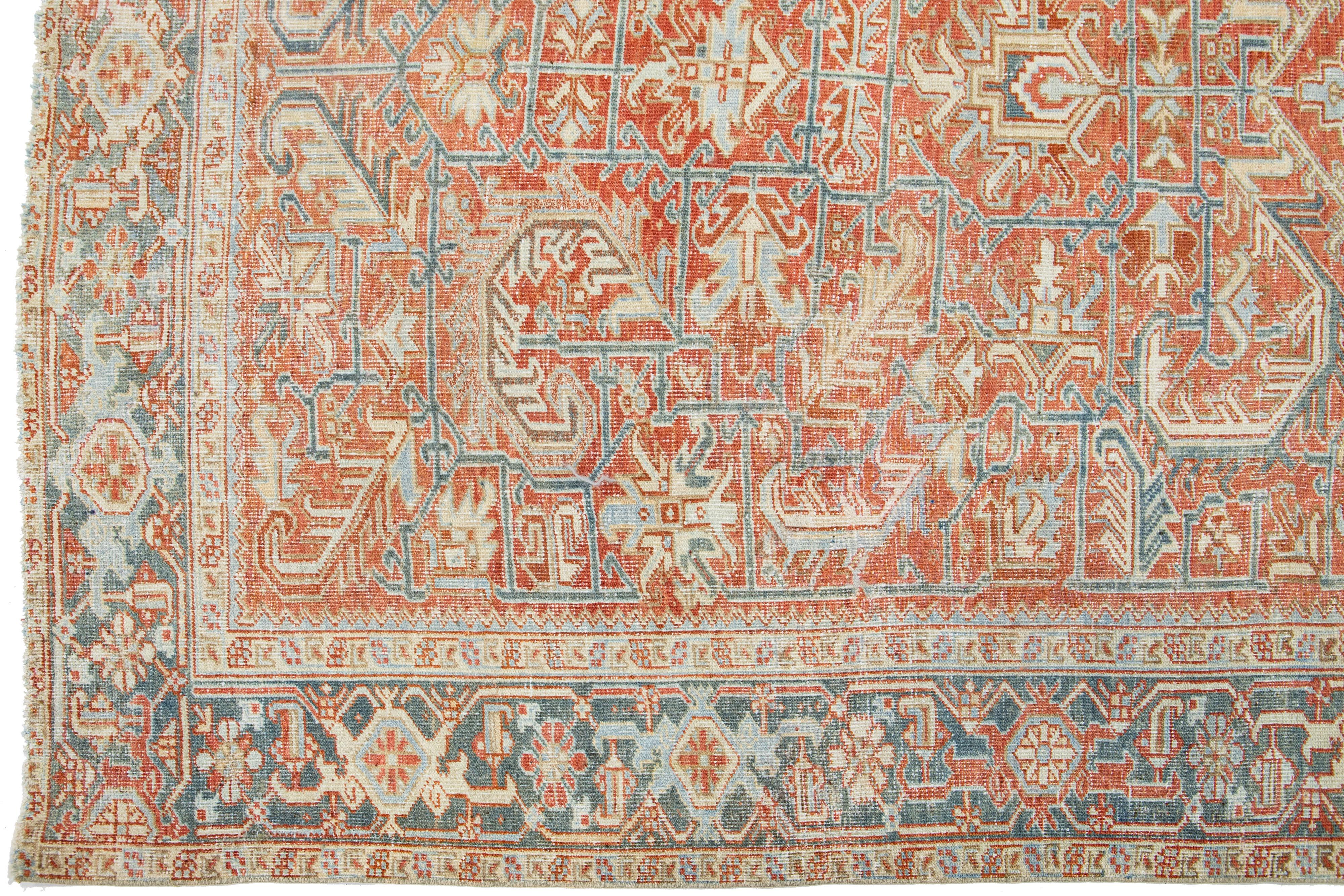 Persian Antique Heriz Wool Rug with an Allover Design Featuring Rust Color Field In Good Condition For Sale In Norwalk, CT