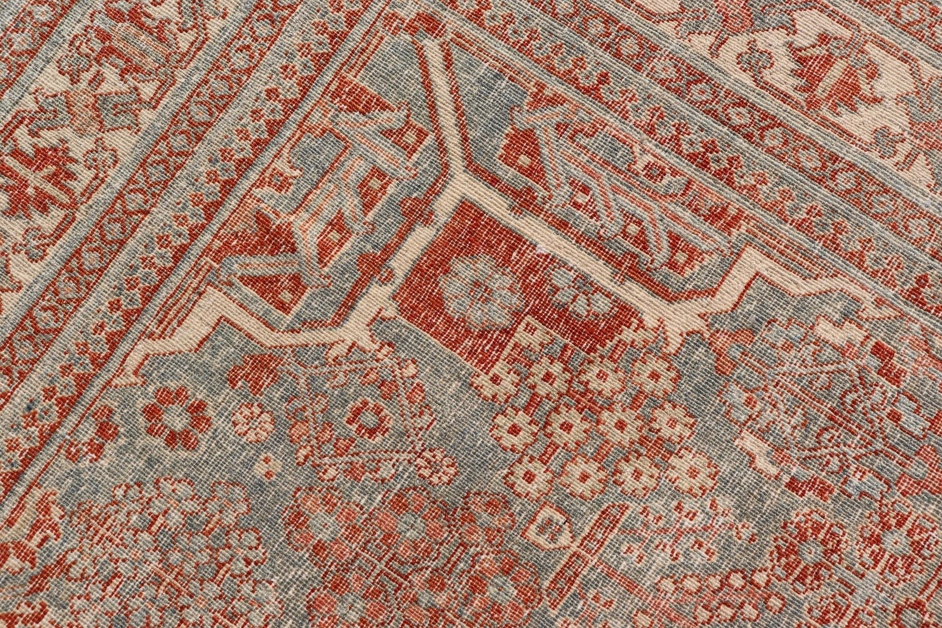 Wool Persian Antique Joshegan Rug with Geometric Medallion Design in Soft Red's For Sale