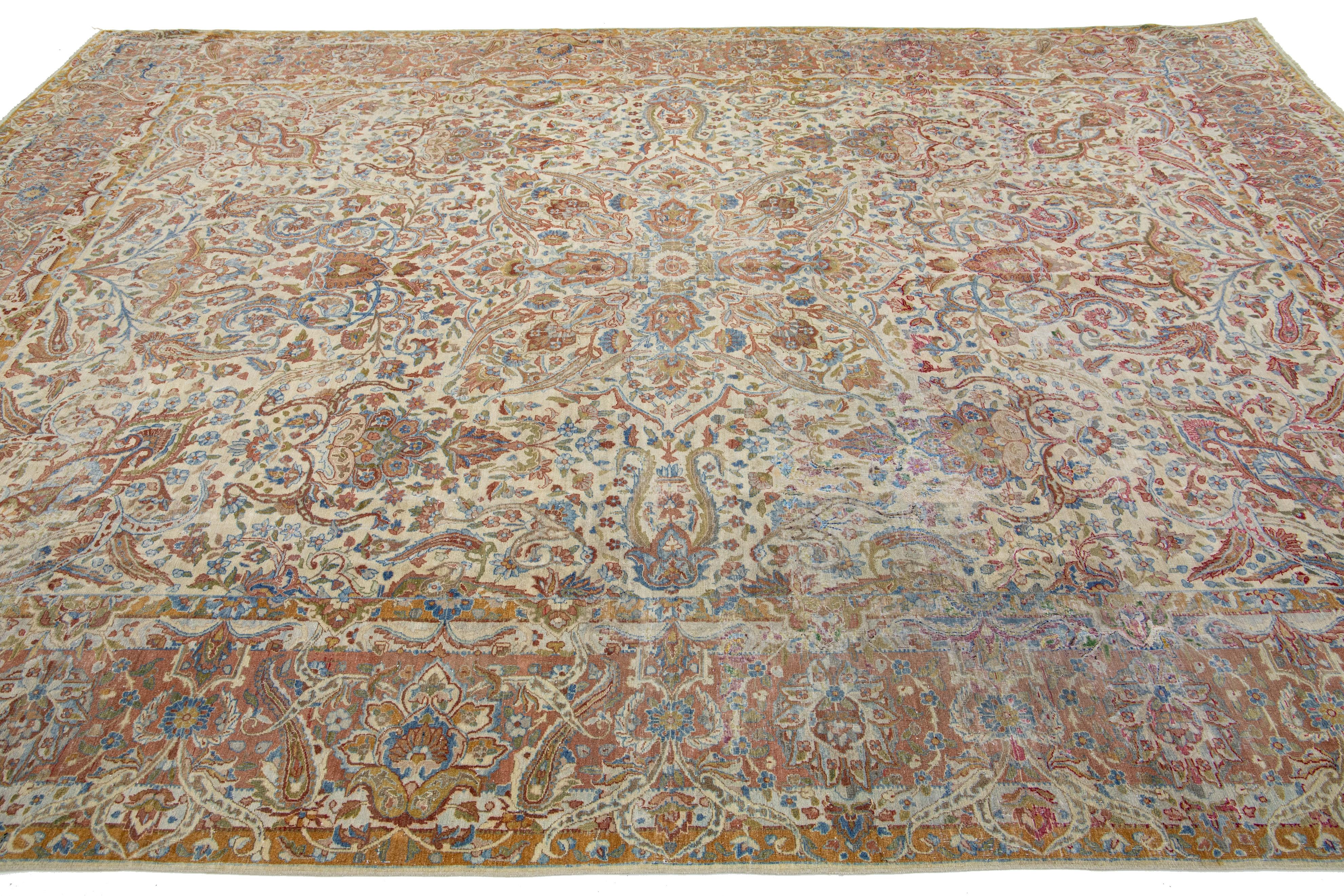 Persischer antiker handgefertigter Kerman-Wollteppich mit mehrfarbigem, geblümtem Design (Handgeknüpft) im Angebot