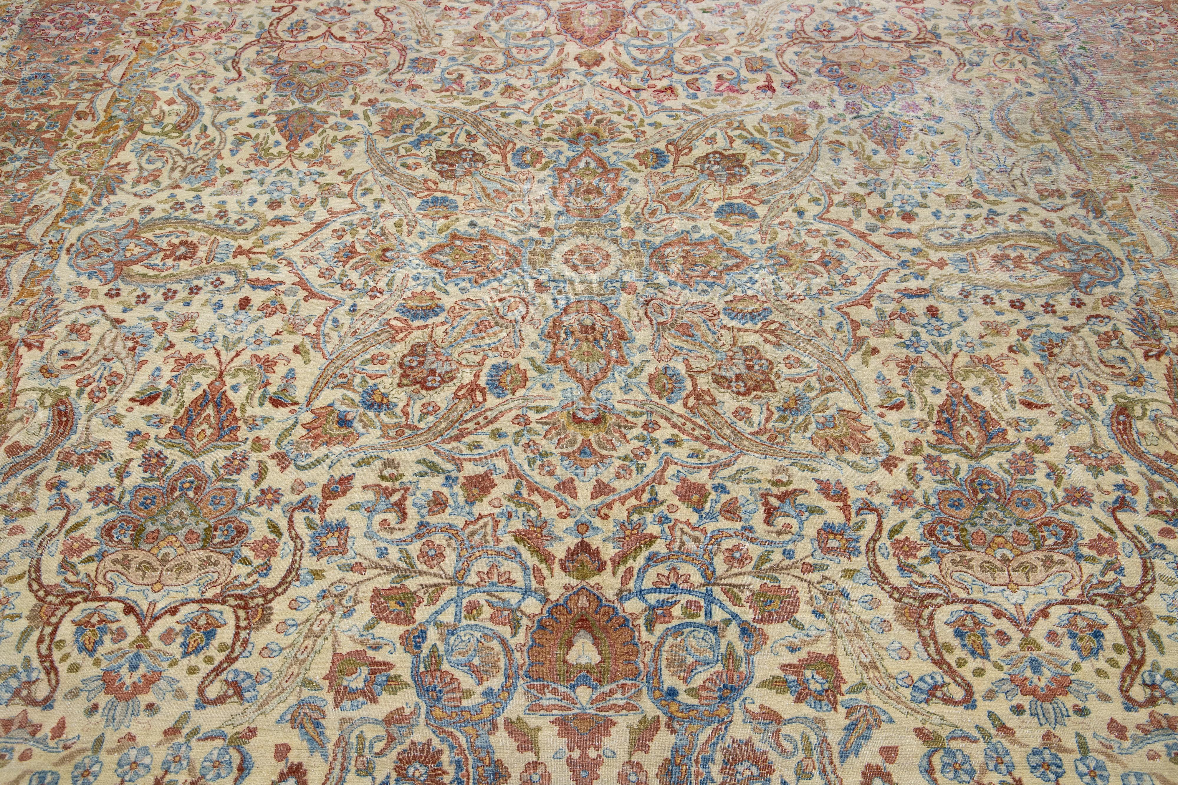 20th Century Persian Antique Kerman Handmade Wool Rug with Multicolor Floral Design For Sale