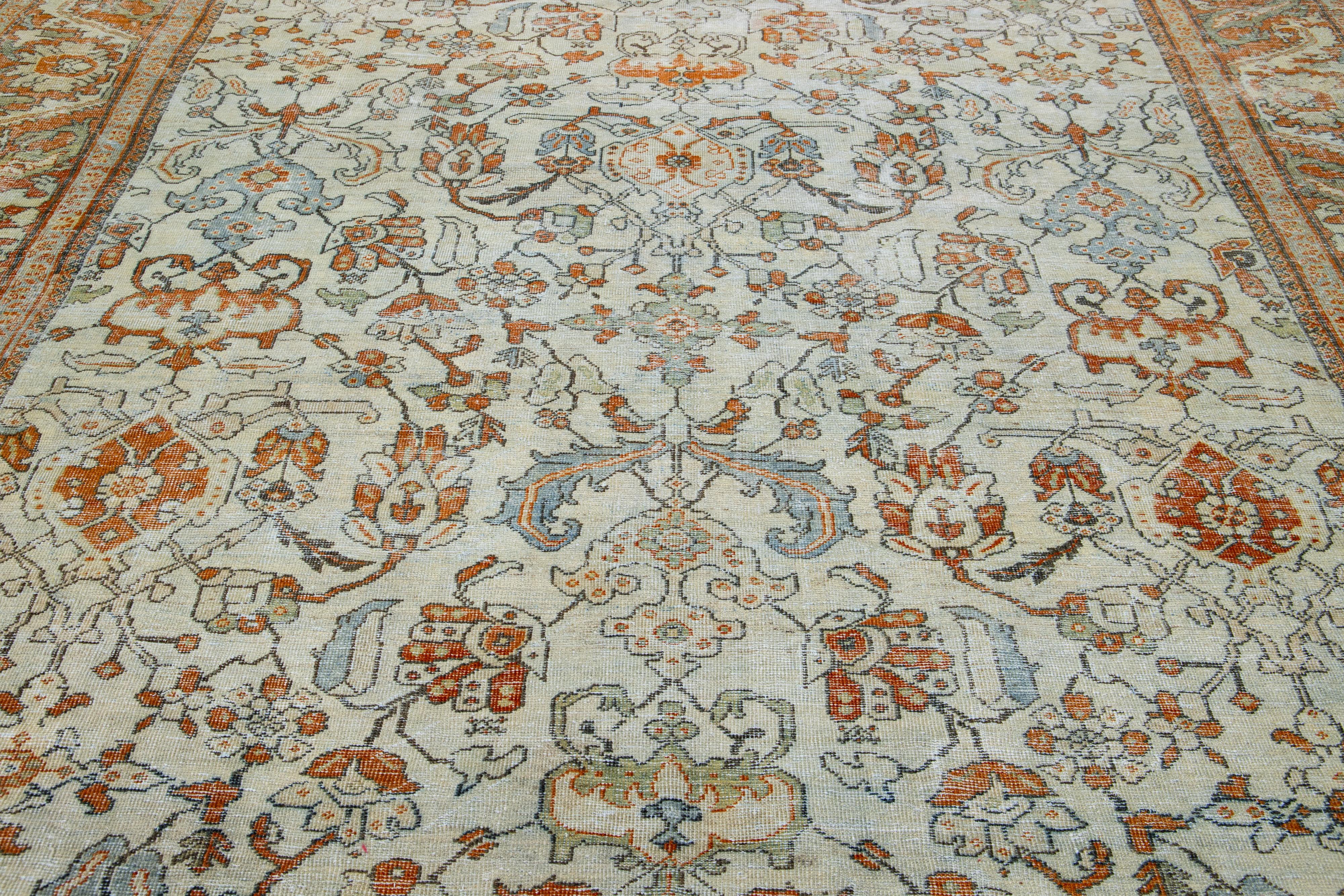 20th Century Persian Antique Mahal Beige And Orange Wool Rug with Allover Pattern For Sale