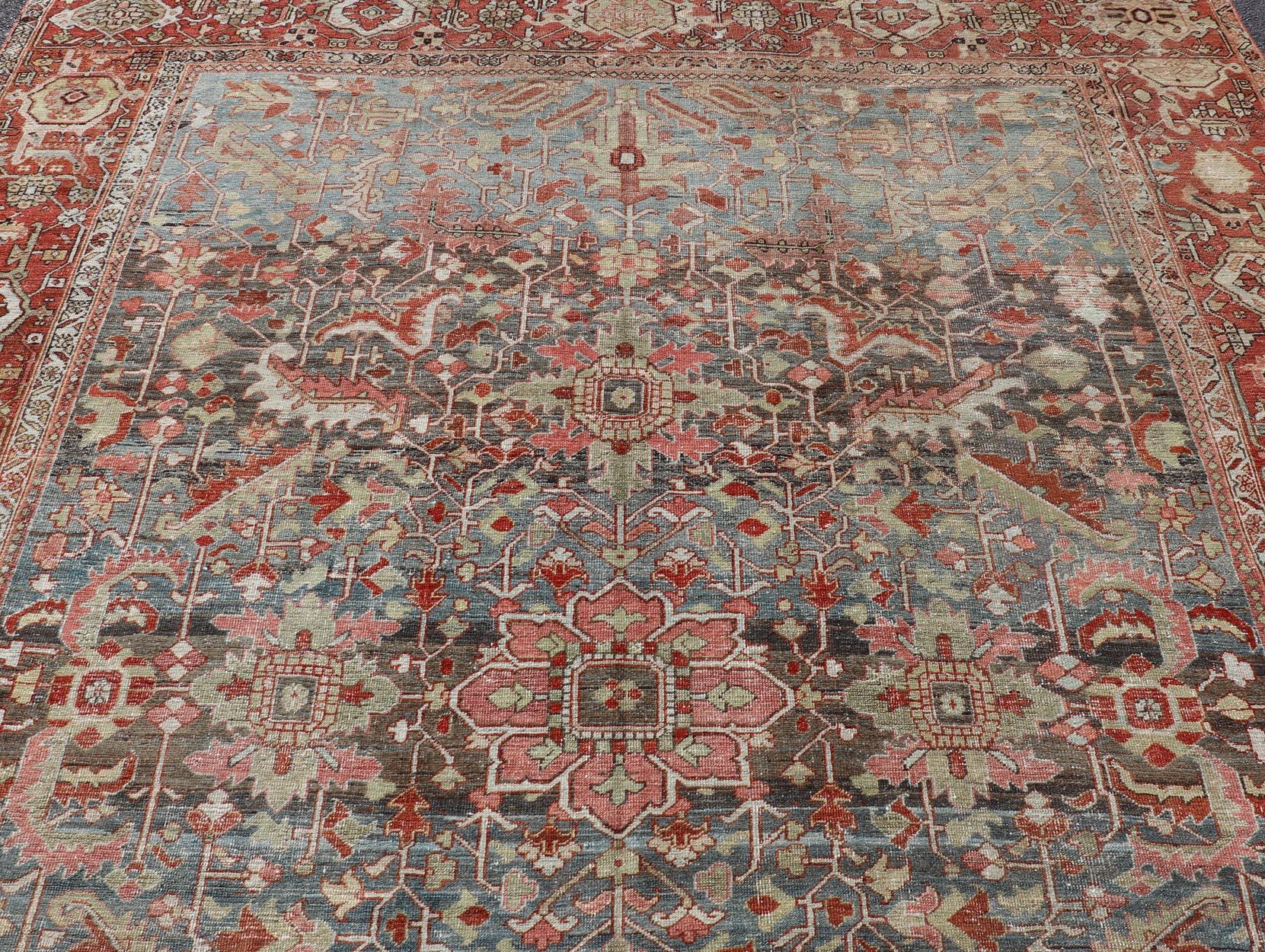 Persian Antique Serapi Rug with All-Over Geometric Design in Gray-Blue and Red. Keivan Woven Arts / Rug / V21-0812-15487, country of origin / type: Iran /Serapi, circa 1900. 
Measures: 9'9 x 11'10 
This lovely Antique Serapi rug, hailing from