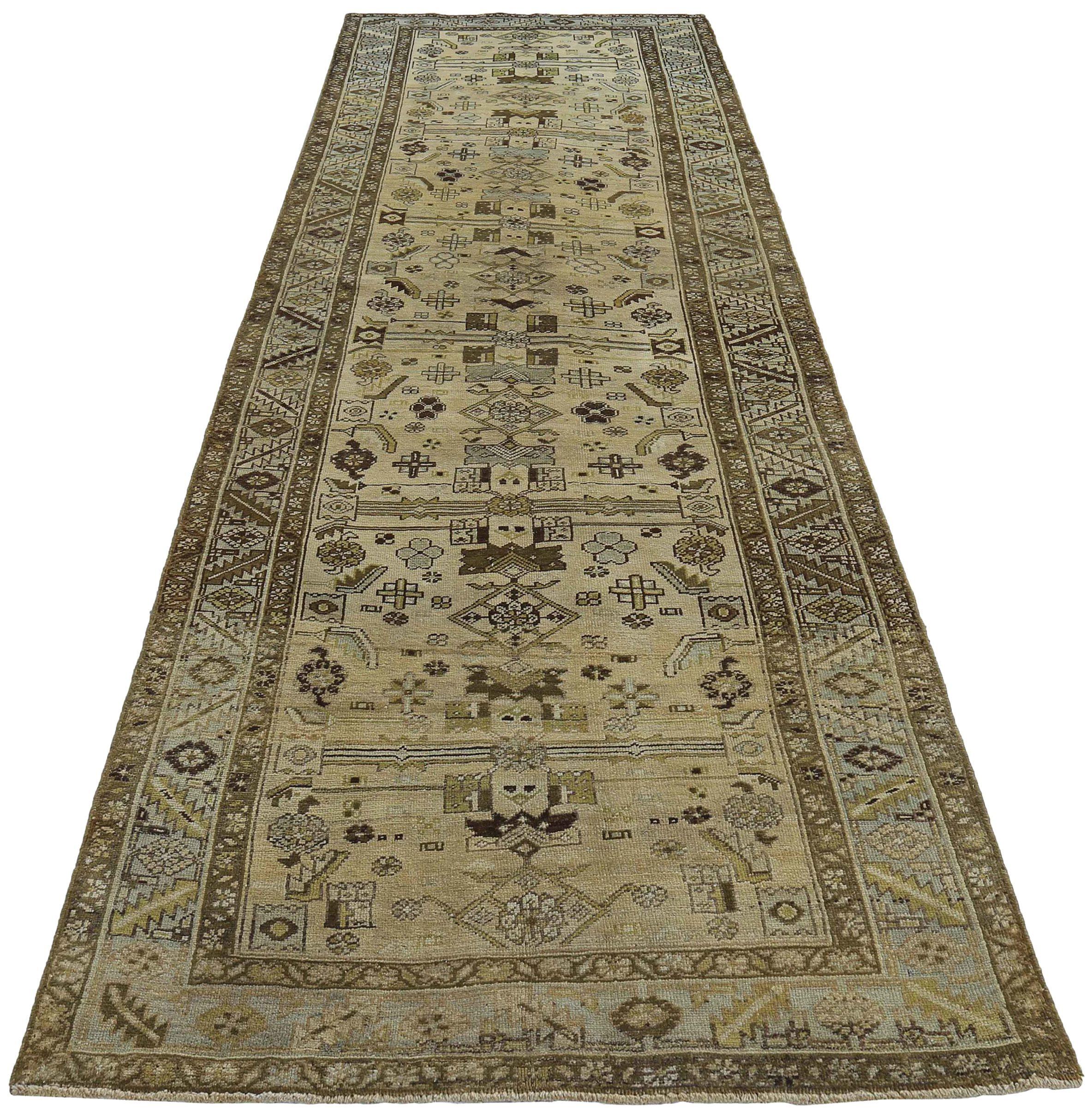 Discover the elegance of Persian Azerbaijan featuring Runner Rug in Circa 1880. Designed with Wool and BrownGreenIvory, this exclusive design is perfect for enhancing your space.