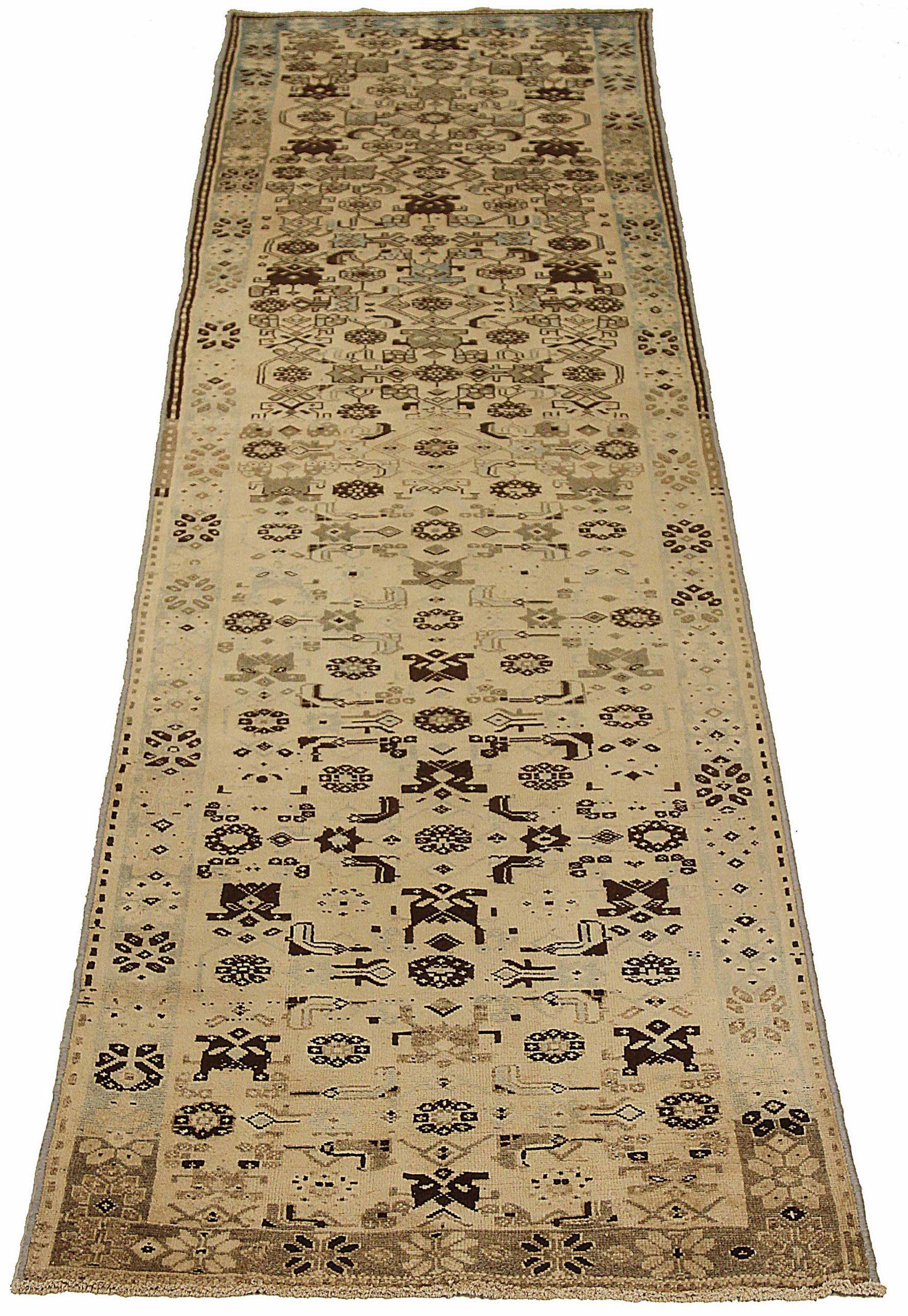 Discover the elegance of Persian Azerbaijan featuring Runner Rug in Circa 1880. Designed with Wool and BrownIvory, this exclusive design is perfect for enhancing your space.