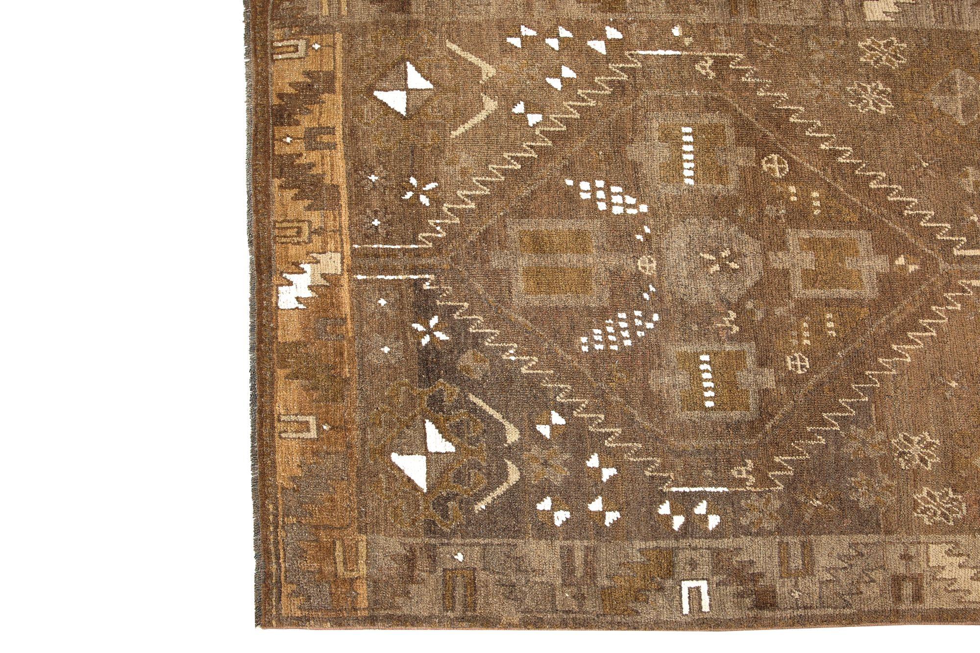 Discover the elegance of Persian Azerbaijan featuring Runner Rug in Circa 1910. Designed with Wool and Brown, this exclusive design is perfect for enhancing your space.