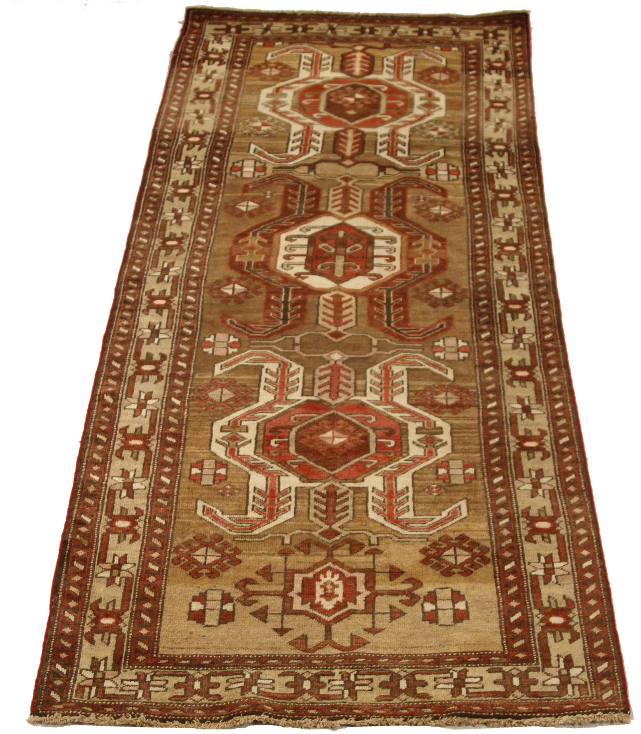 Discover the elegance of Persian Azerbaijan featuring Small Rug in Circa 1880. Designed with Wool and IvoryRedTaupe, this exclusive design is perfect for enhancing your space.