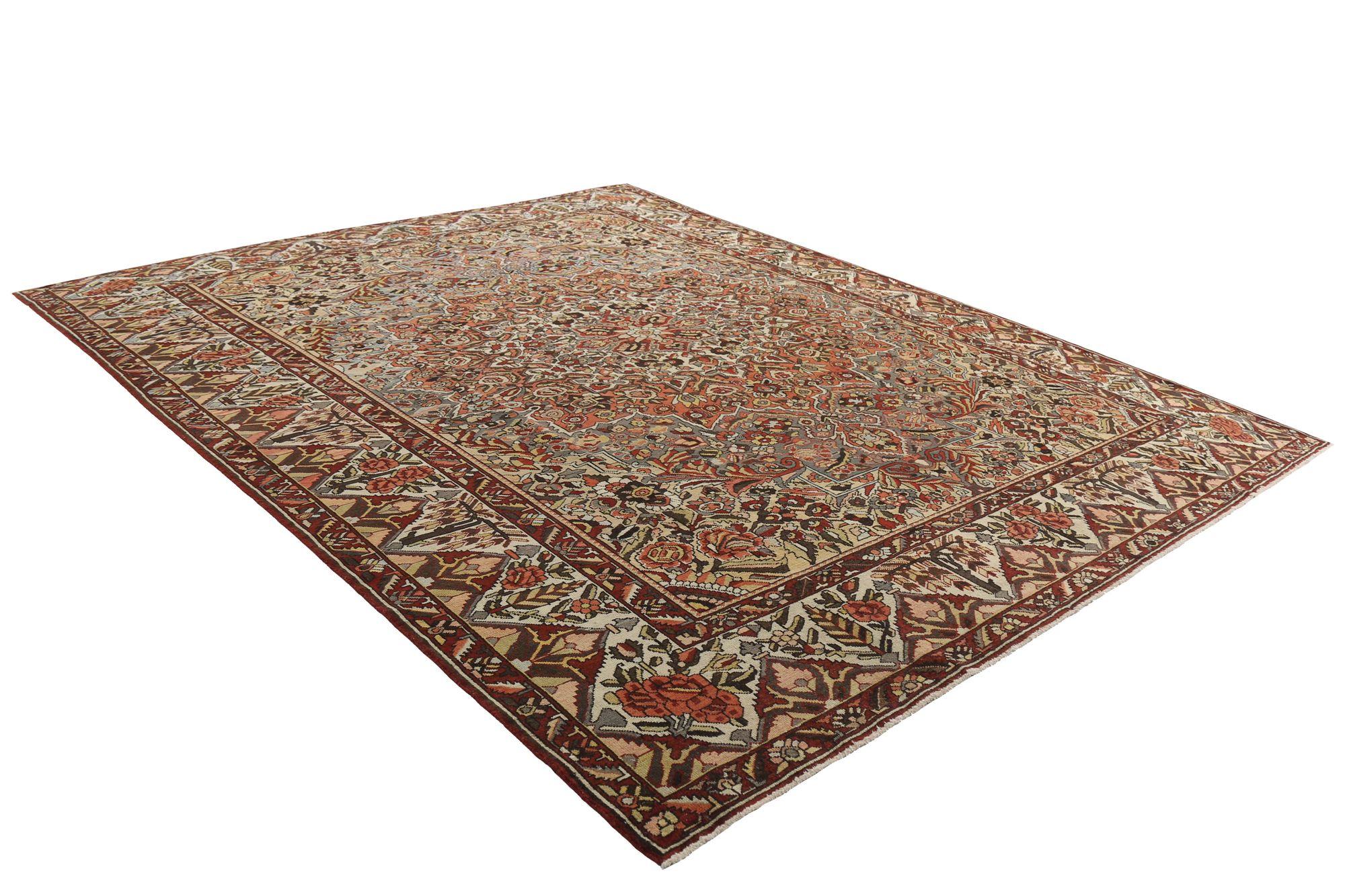 Entdecken Sie die Eleganz des persischen Bachtiari mit dem übergroßen Teppich von CIRCA 1910. Dieses exklusive Design aus Wolle und Blau-Elfenbein-Rot ist perfekt, um Ihren Raum zu verschönern.