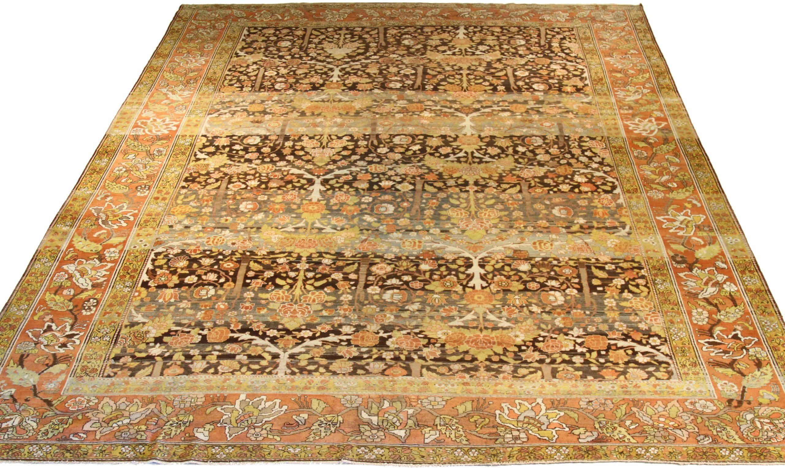 Scopri l'eleganza del tappeto persiano Bakhtiari Over Size Rug del 1880. Progettato con lana e marrone-avorio-rosso-giallo, questo design esclusivo è perfetto per valorizzare il tuo spazio.