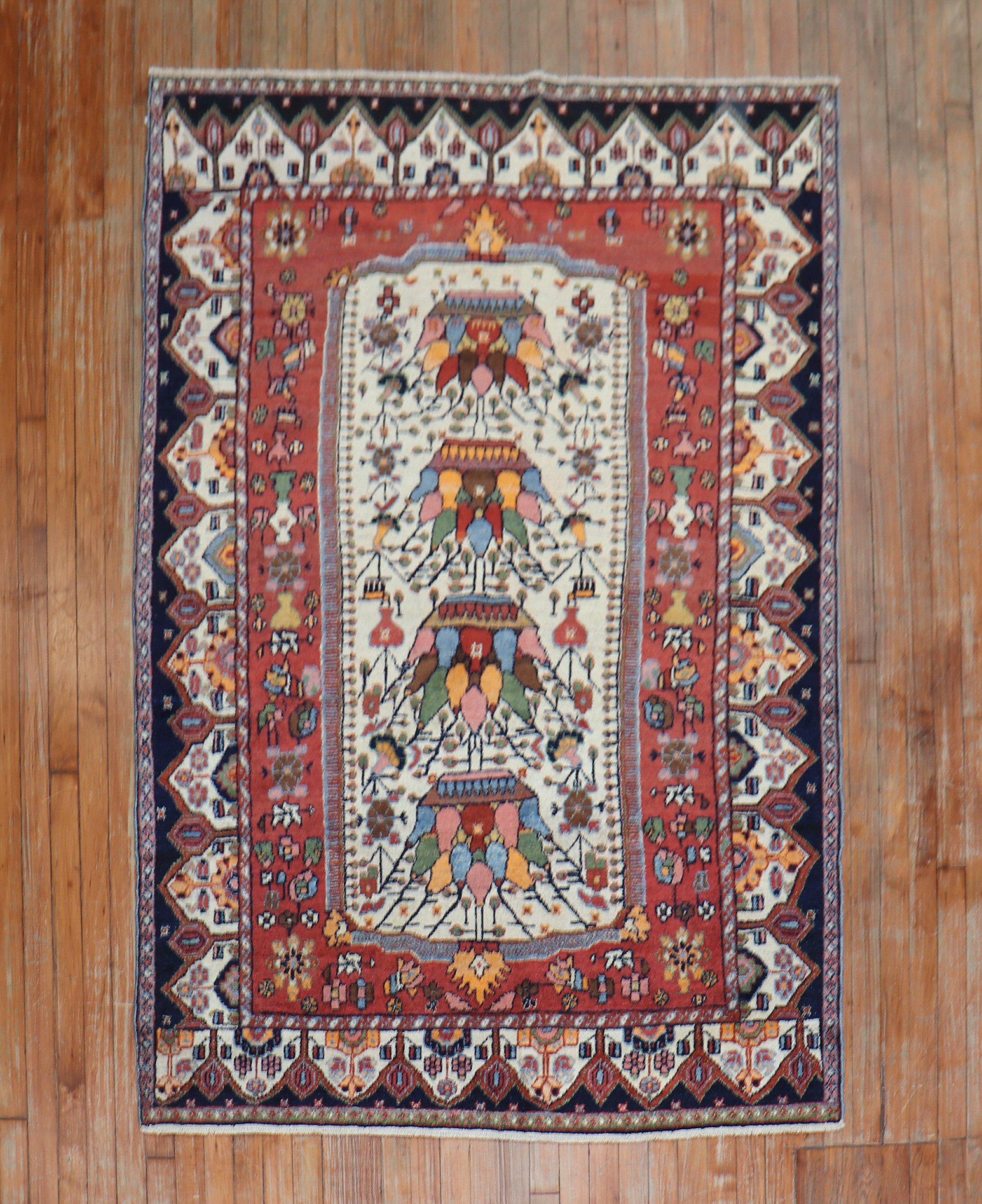 A traditional colorful Persian Bakhtiari accent size rug,

circa 1940. Measures: 4'6
