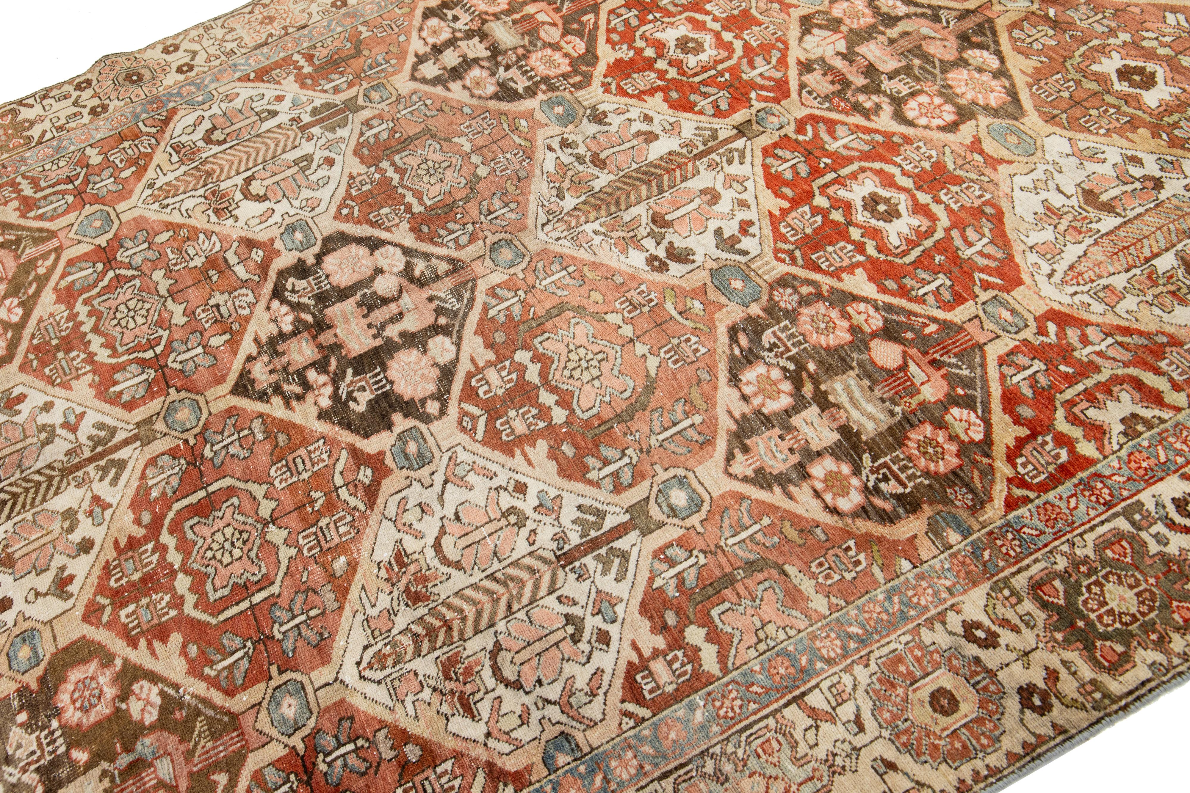 Islamic Persian Bakhtiari Rust Wool Rug with Allover Floral Pattern From The 1910s For Sale