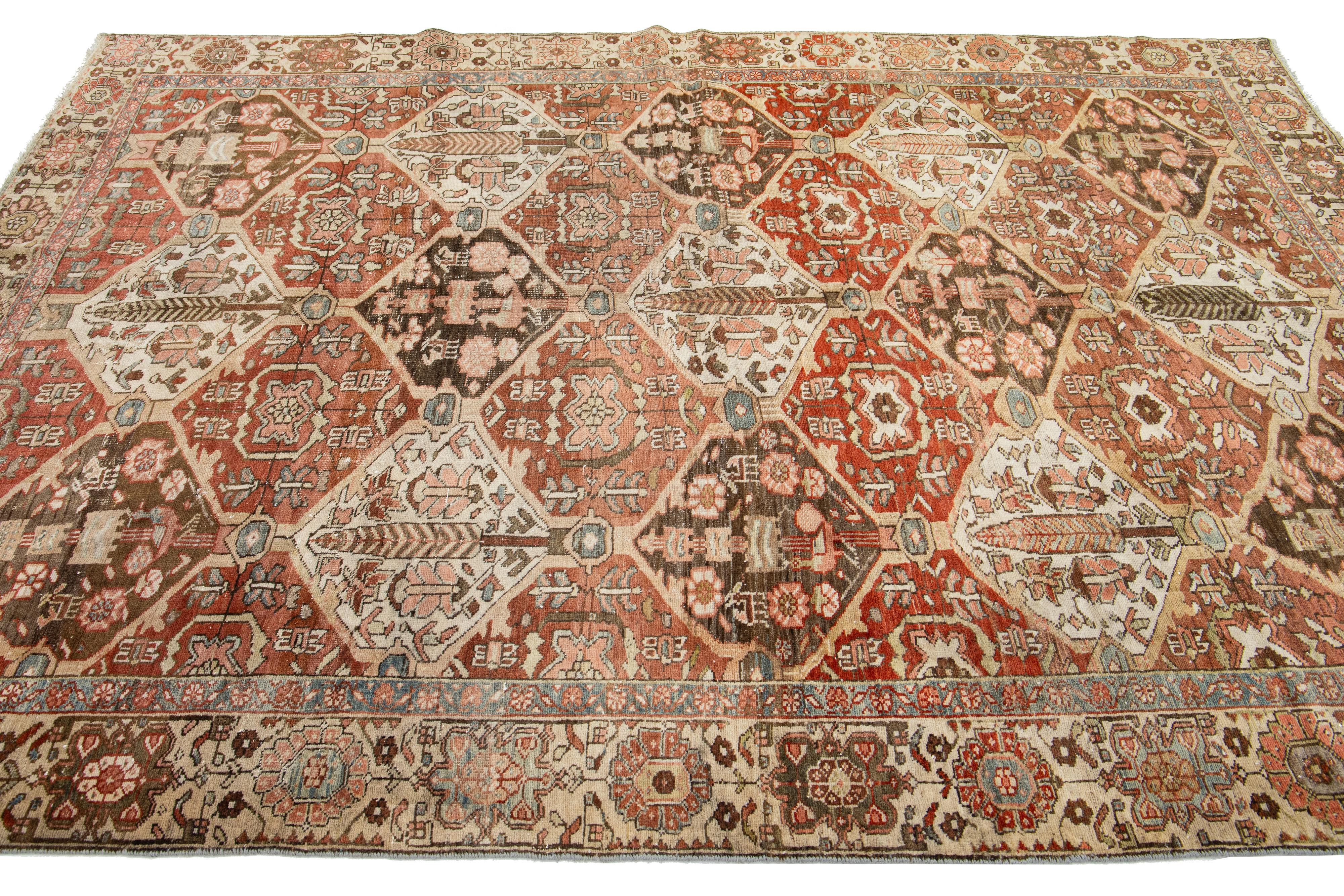 Hand-Knotted Persian Bakhtiari Rust Wool Rug with Allover Floral Pattern From The 1910s For Sale