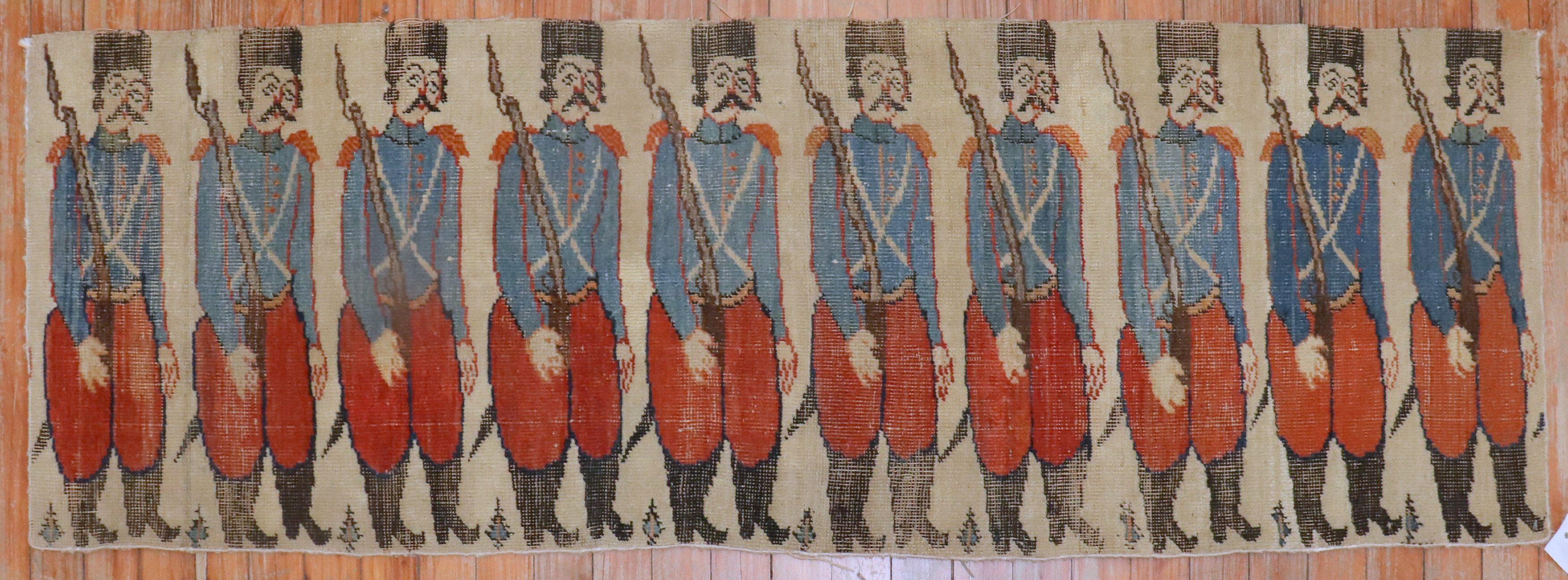 Mid 19th Century Persian Bakshaish Fragment Rug with 10 soldiers standing on a beige field.

Measures: 19''x 60''.