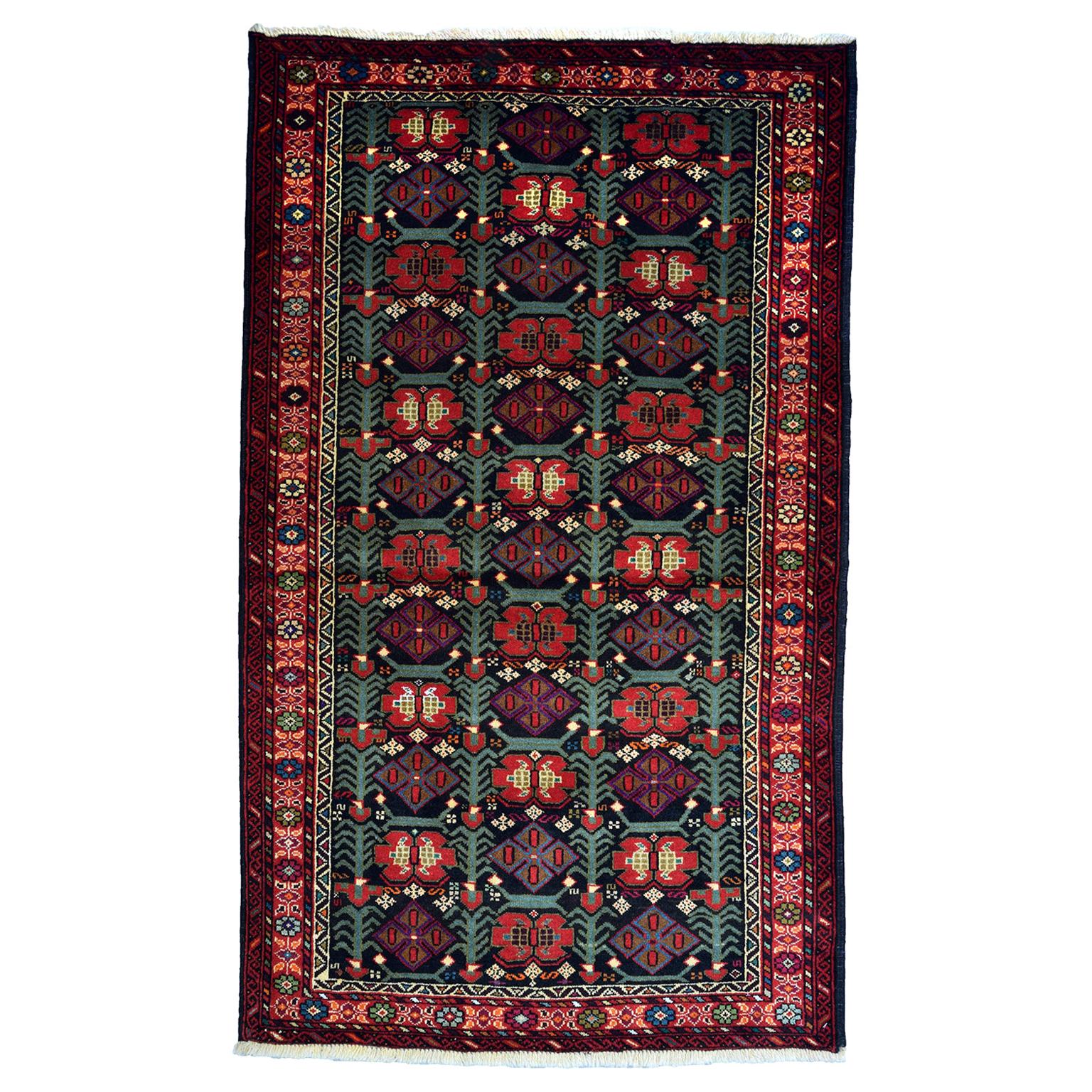 Vintage 1950s Wool Persian Balouchi Rug, 3' x 5' For Sale