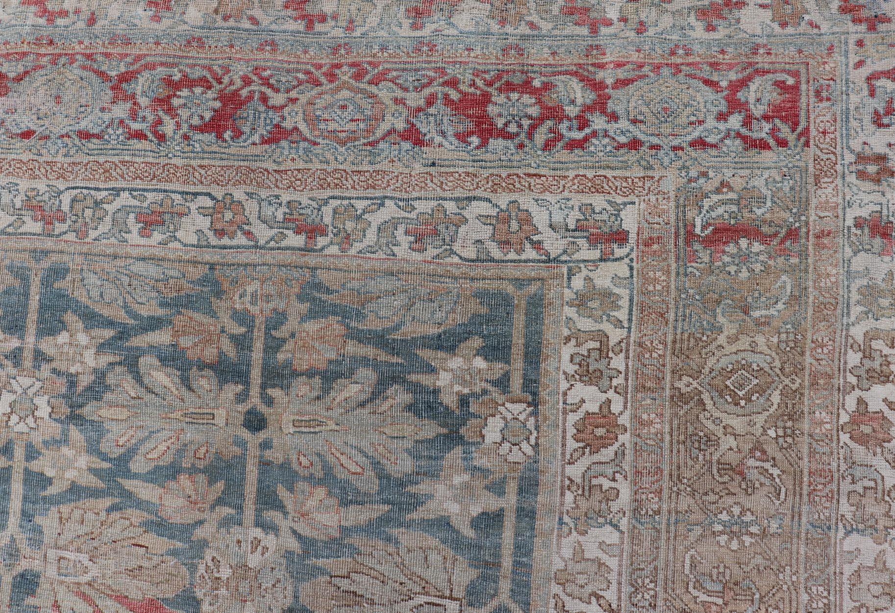 Large antique Persian bidjar rug in light blue background and alternating floral pattern, Keivan Woven Arts  / TRA-8051. Large antique Bidjar Late 19th Century
Measures: 12'9 x 17'10
Distinguished primarily by their dense, durable weaves, Bidjar
