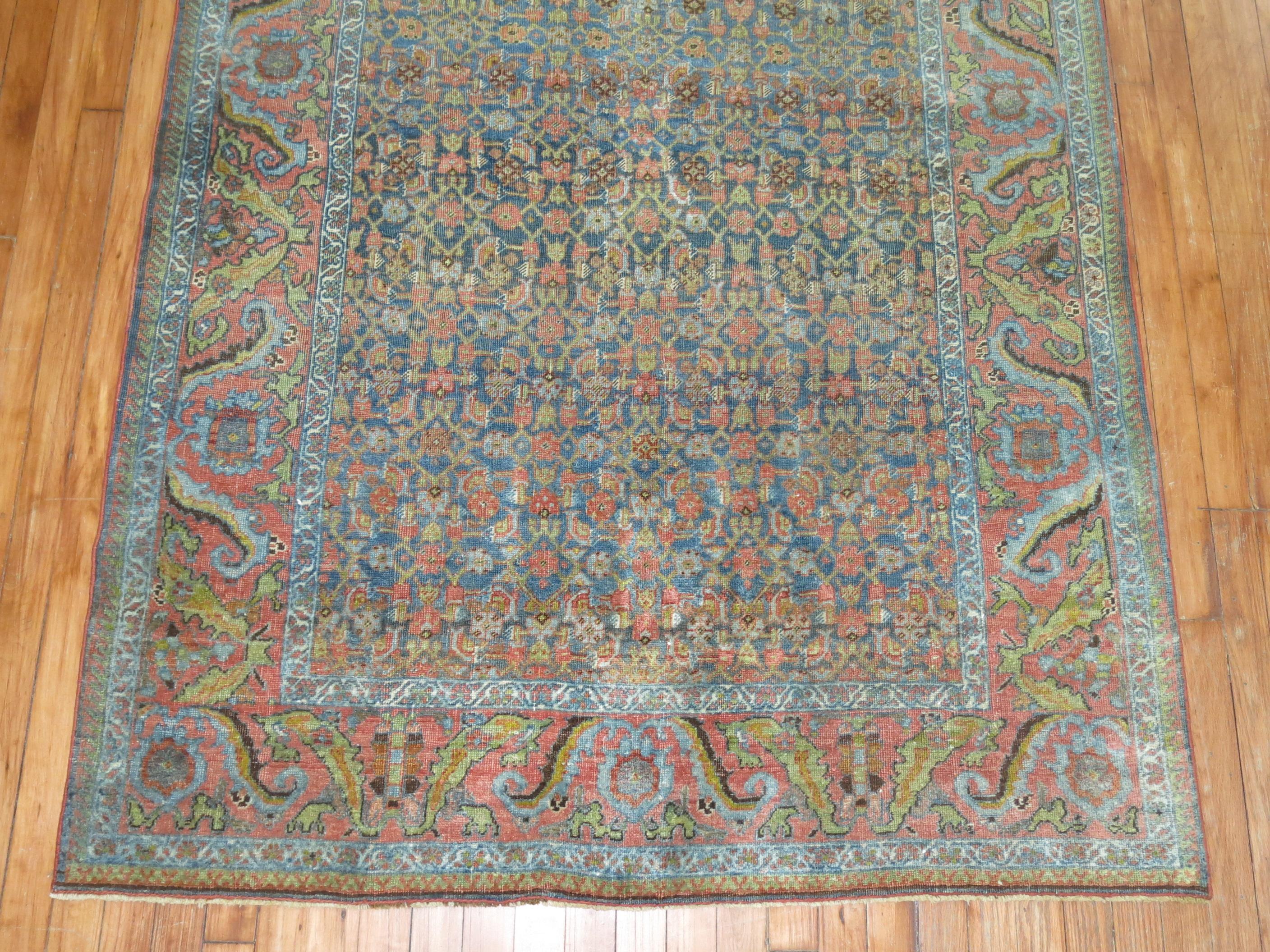 A 20th century Persian Bidjar rug with an all-over Herati design. Accents in blue, light green and pink terracotta. Classic and everlasting. Make sure to check the detailed shots.

       
