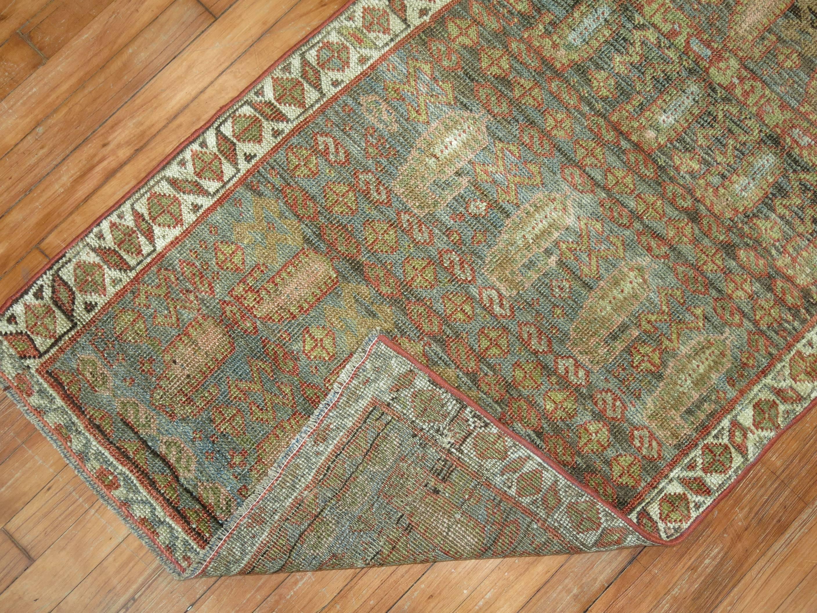 Early 20th century Persian Bidjar rug in warm earth tones.
 
     