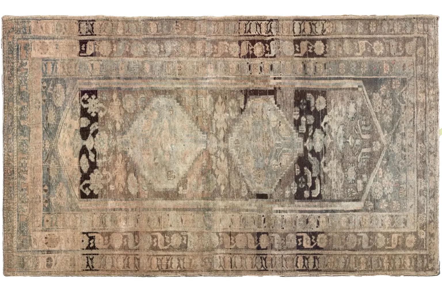 A Glimpse into History: The Bijar Prayer Rug
Uncover the rustic elegance and enduring spirit of this remarkable Persian Bijar rug. Hailing from the Kurdish weaving heartland of Iran, this piece is a beautiful example of traditional craftsmanship and