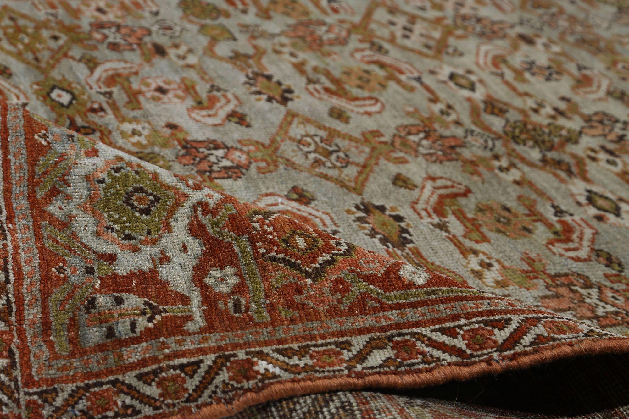 Entdecken Sie die Eleganz des persischen Bijar mit Teppichen aus der Zeit um 1910. Dieses exklusive Design aus Wolle und ElfenbeinHellblauRot ist perfekt, um Ihren Raum zu verschönern.