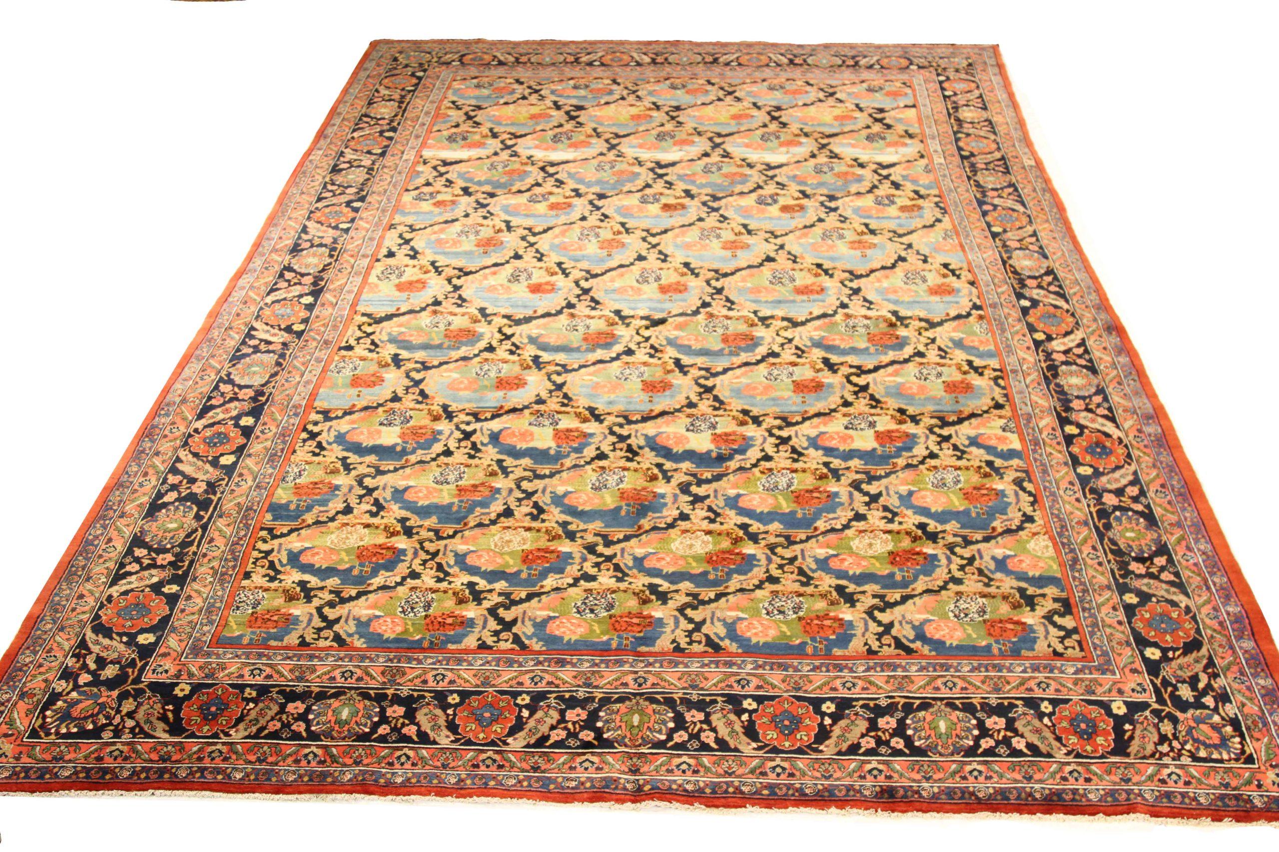 Entdecken Sie die Eleganz des persischen Bijar mit dem Over-Size-Teppich aus der Zeit um 1880. Dieses exklusive Design aus Wolle und BlauMarineblauRot ist perfekt, um Ihren Raum aufzuwerten.