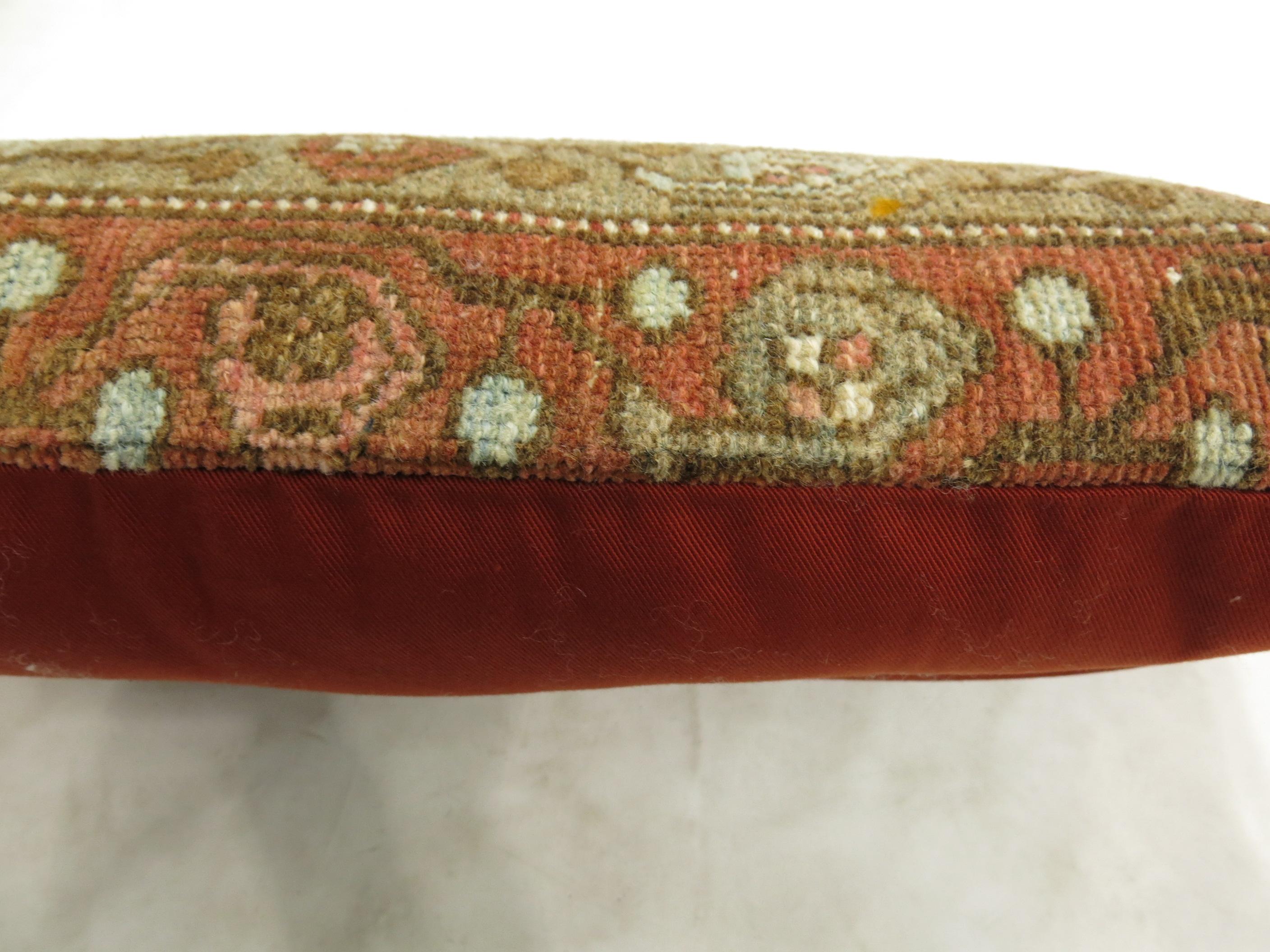 A bolster size pillow made from an early 20th century Persian rug.

Measures: 12