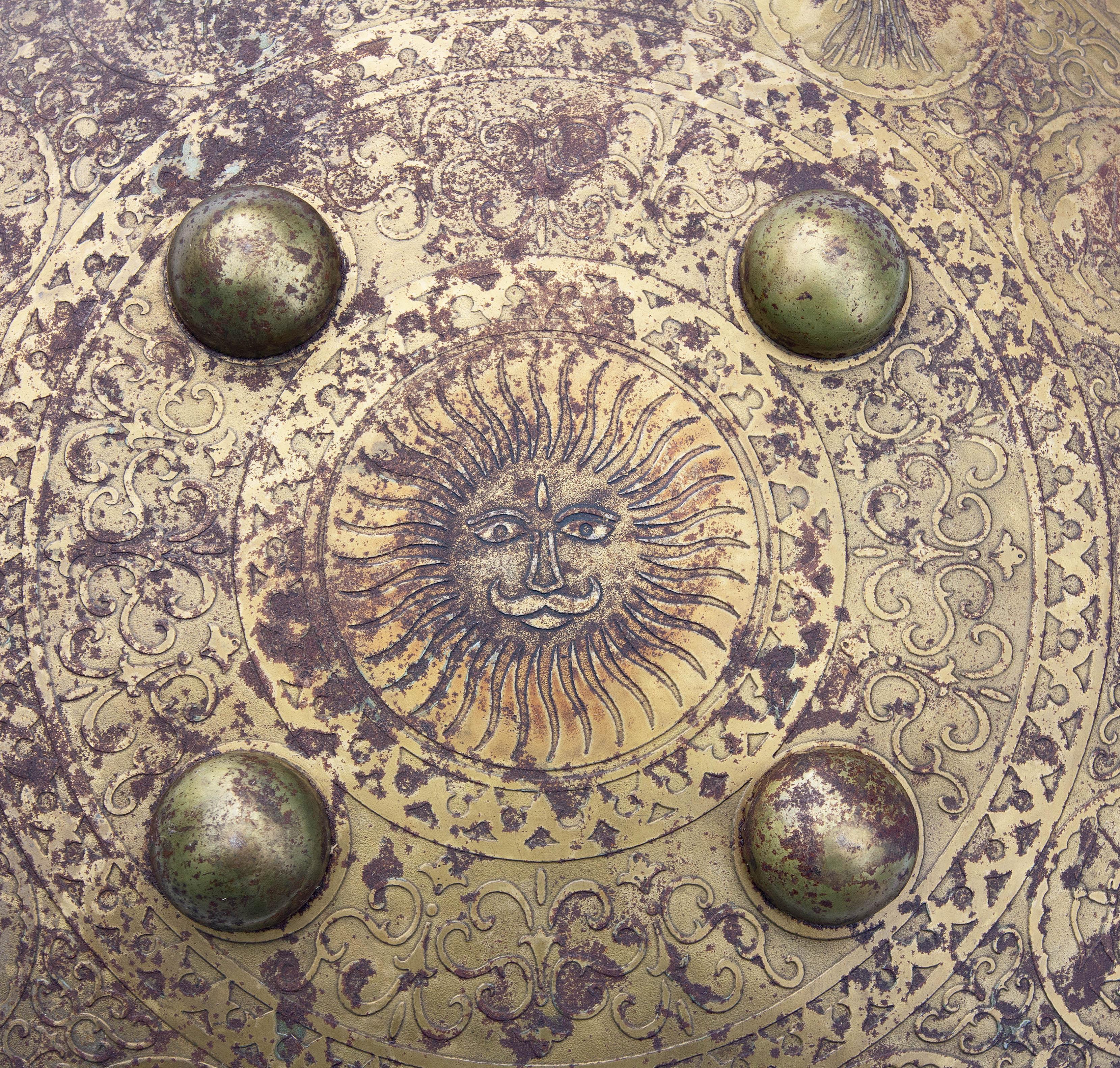 Persian brass and iron shield. Engraved with signs of the zodiac. Hide interior. Early 20th century.