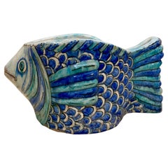 Vaso da giardino con pesce persiano