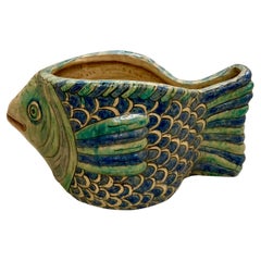 Vaso da giardino con pesce persiano