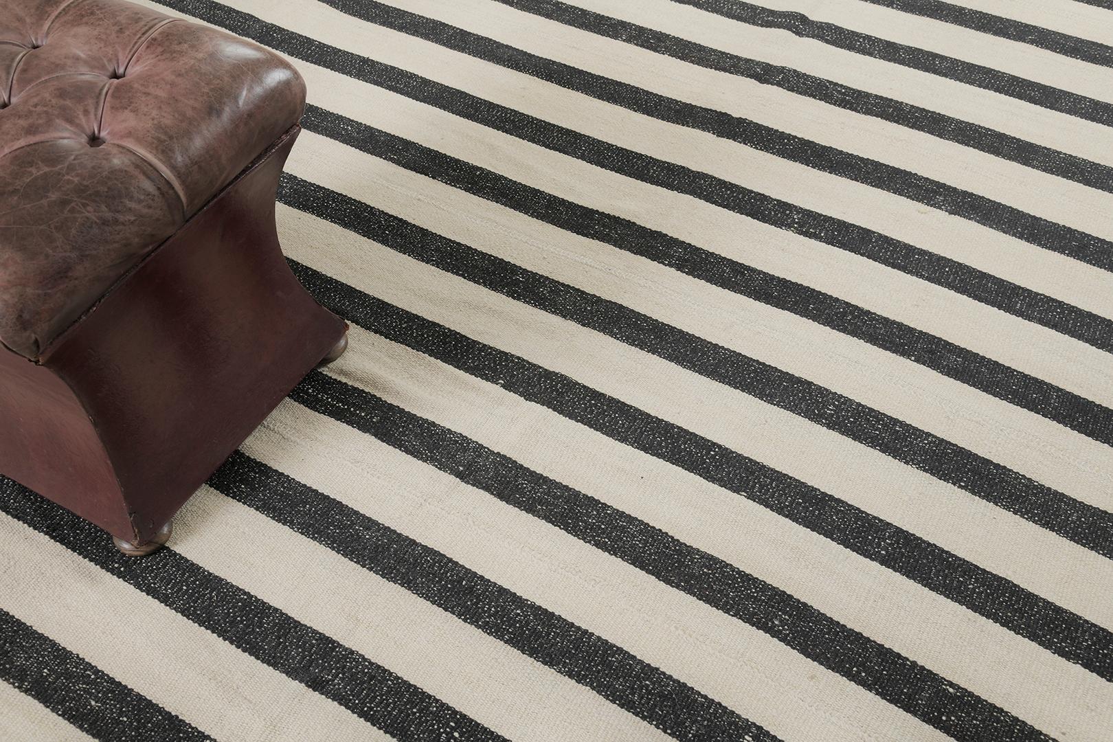 Persian Jejim Kilim is flat weave wool that has dark and light linear stripes. With its simplicity and grace, it is flexible in every interior you want to arrange with. Mehraban's collection of these fine Persian rugs is the most intricate and