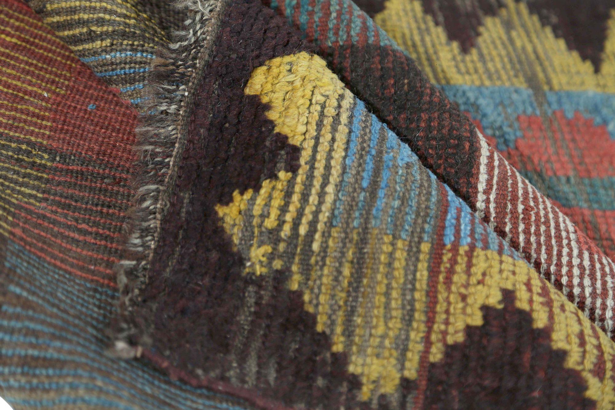 Discover the elegance of Persian Gabbeh featuring Small Rug in Circa 1910. Designed with Wool and BlueBrownIvoryRedYellow, this exclusive design is perfect for enhancing your space.