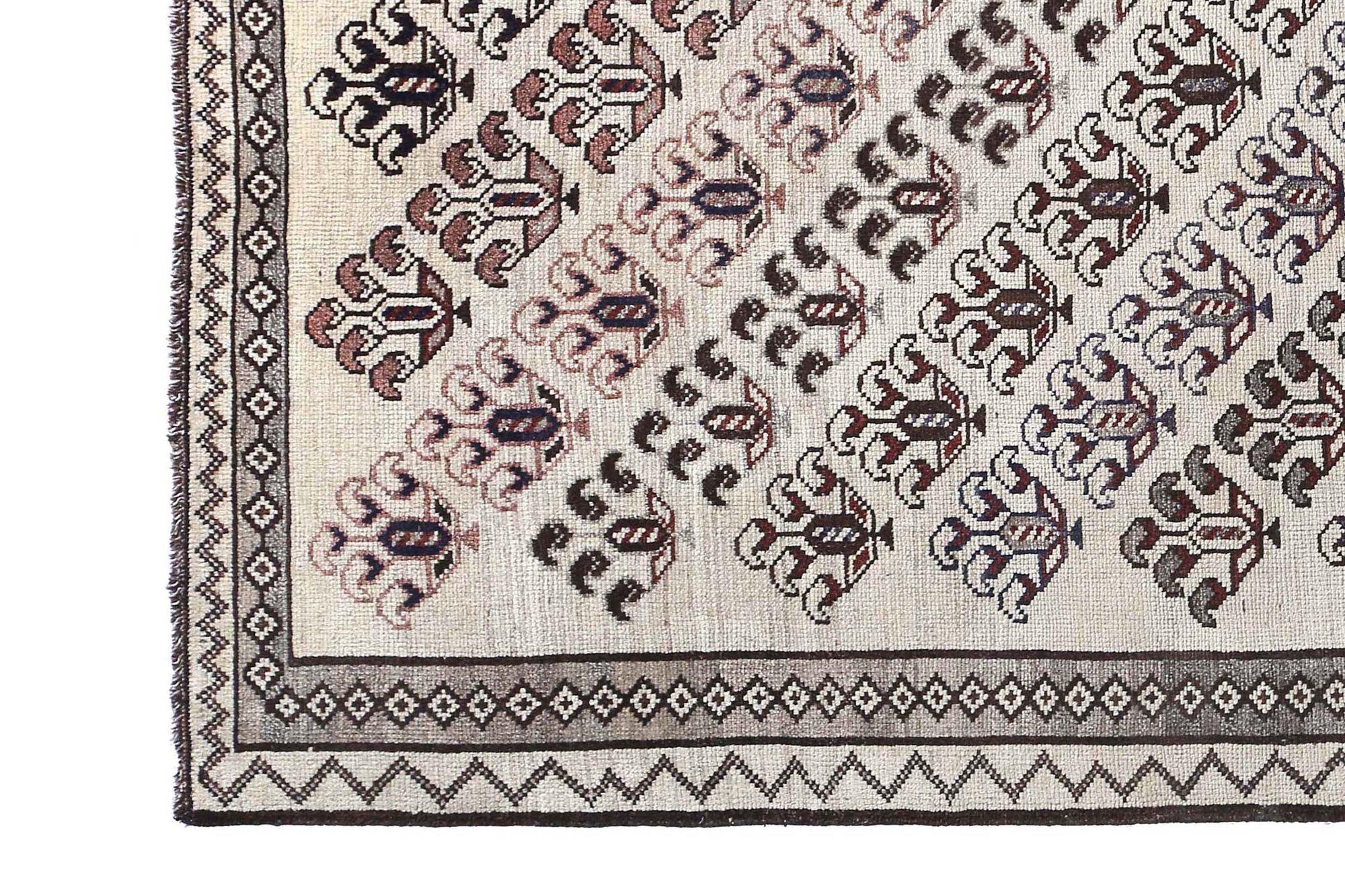 Entdecken Sie die Eleganz des persischen Gabbeh mit dem kleinen Teppich CIRCA 1910. Dieses exklusive Design aus Wolle und Elfenbein ist perfekt, um Ihren Raum zu verschönern.