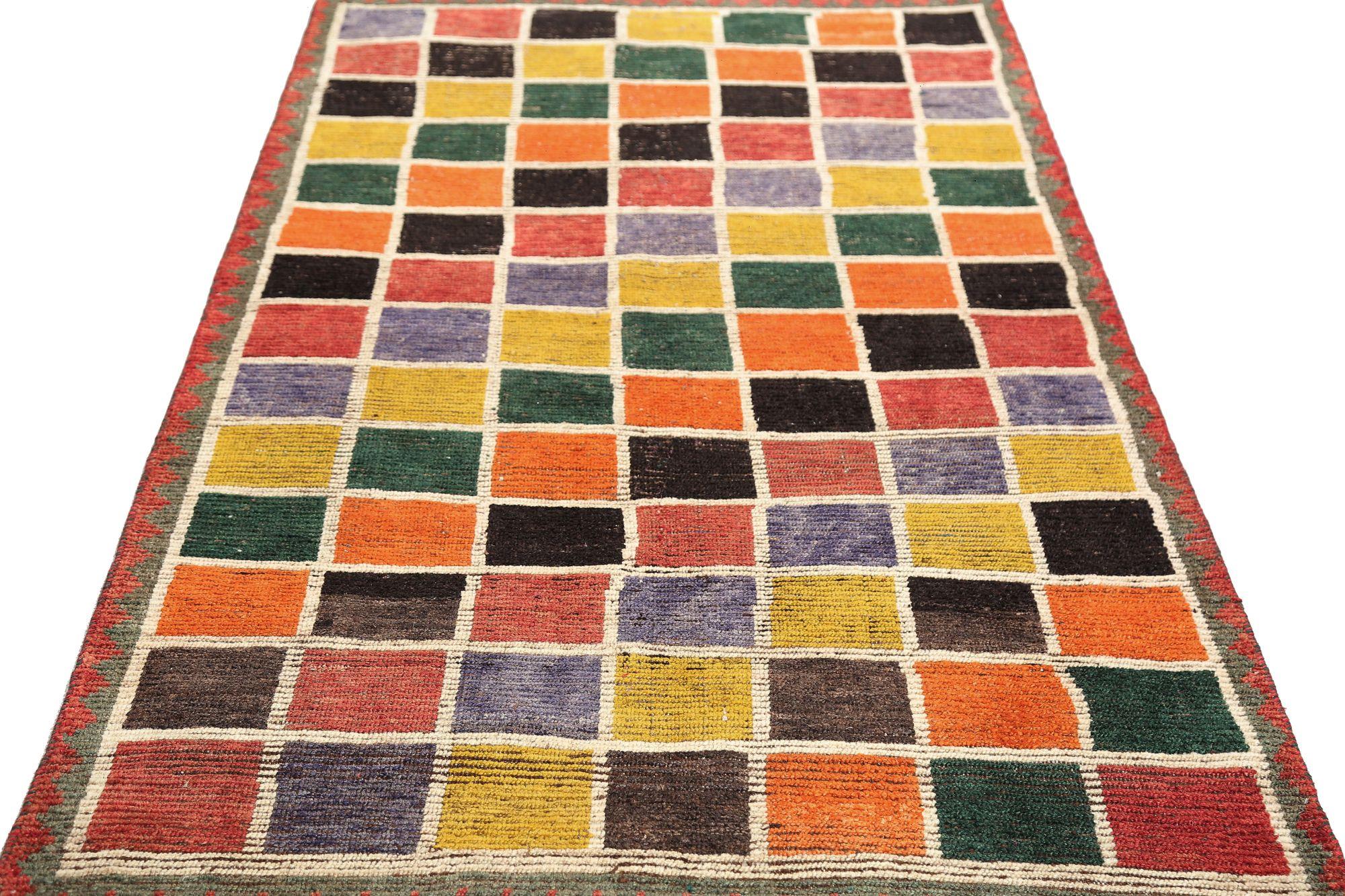 Discover the elegance of Persian Gabbeh featuring Small Rug in Circa 1940. Designed with Wool and OrangePurpelRedYellow, this exclusive design is perfect for enhancing your space.