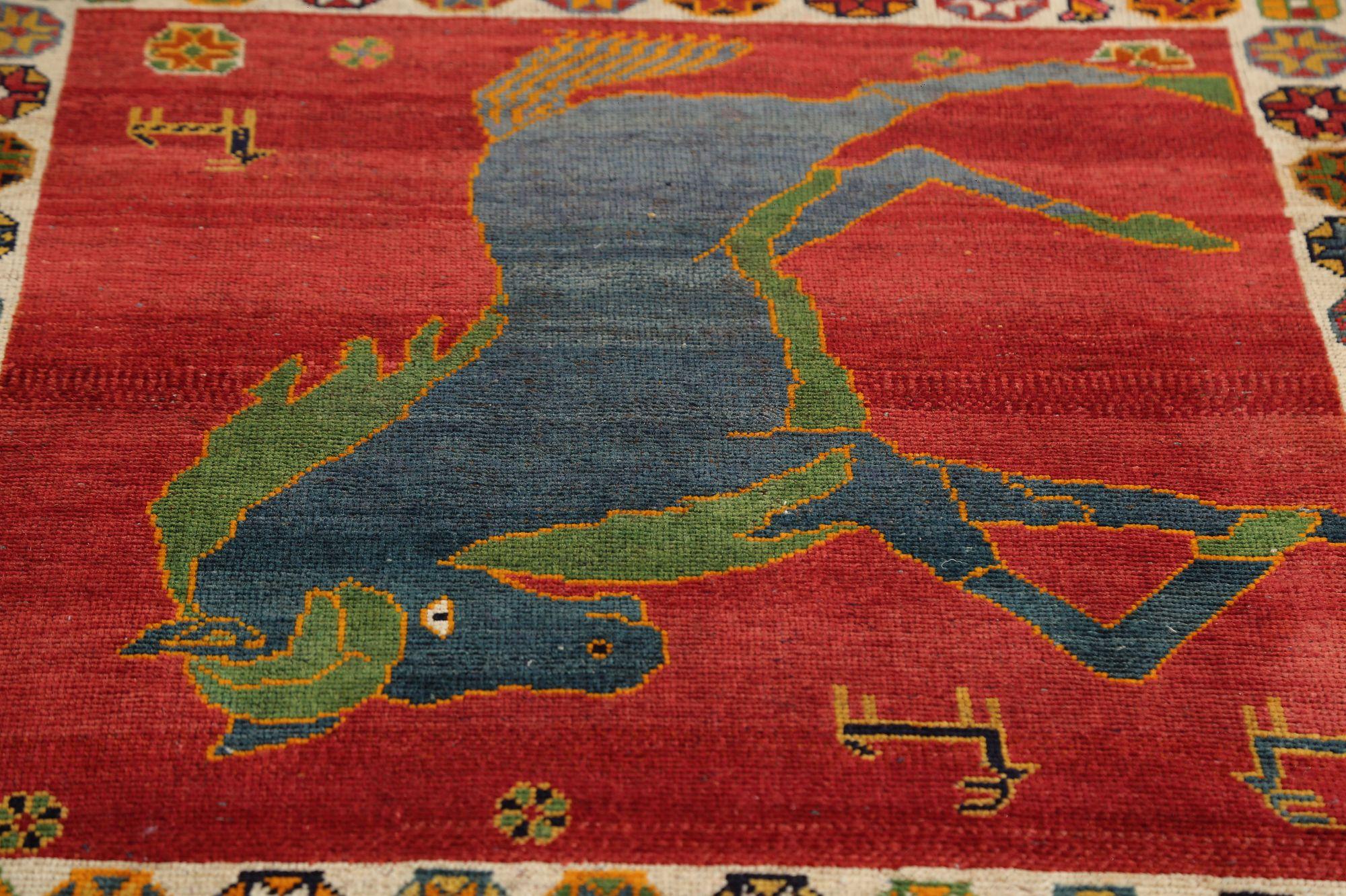 Discover the elegance of Persian Gabbeh featuring Small Rug in Circa 1940. Designed with Wool and Red, this exclusive design is perfect for enhancing your space.