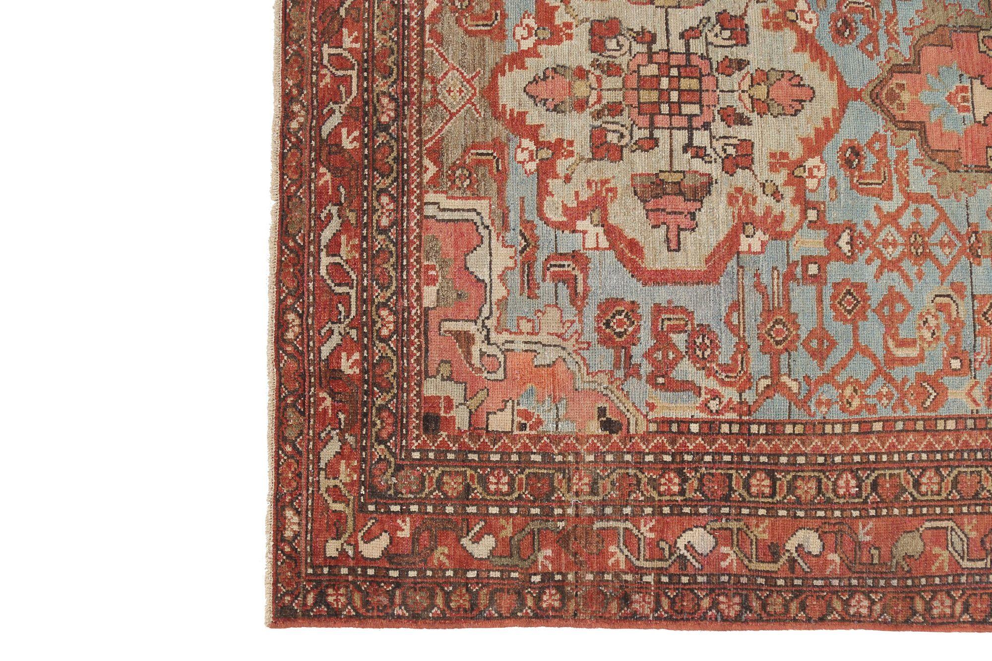 Entdecken Sie die Eleganz der persischen Hamadan-Teppiche aus der Zeit um 1910. Dieses exklusive Design aus Wolle und Blau-Elfenbein-Rot ist perfekt, um Ihren Raum zu verschönern.