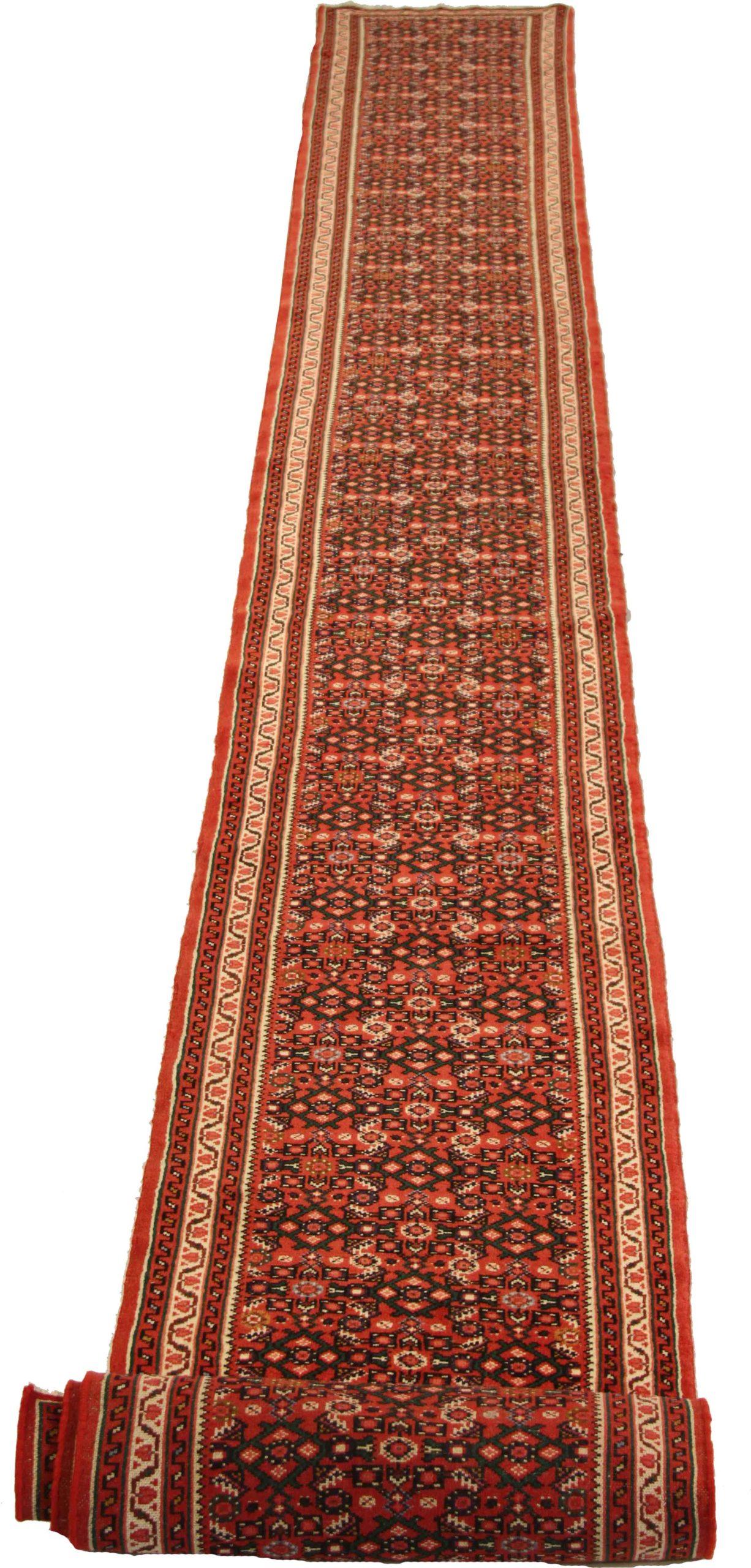 Entdecken Sie die Eleganz des persischen Hamadan-Teppichs mit Läufer aus der Zeit um 1910. Dieses exklusive Design aus Wolle und ElfenbeinMarineblauRot ist perfekt, um Ihren Raum zu verschönern.