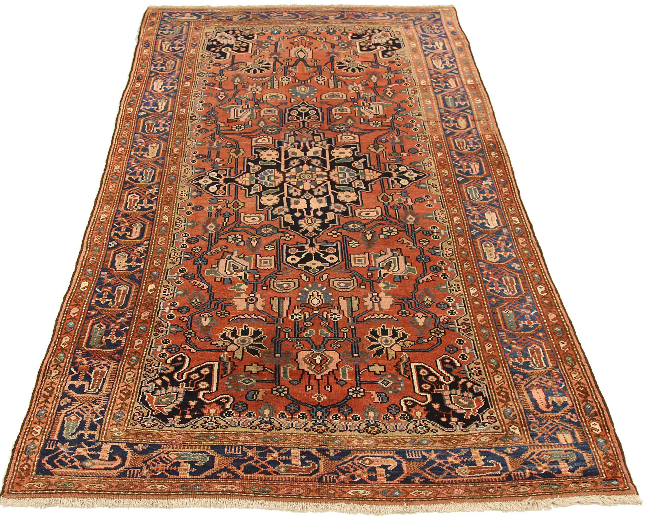 Entdecken Sie die Eleganz des persischen Hamadan mit dem kleinen Teppich von CIRCA 1880. Dieses exklusive Design aus Wolle und Blau-Elfenbein-Rot ist perfekt, um Ihren Raum zu verschönern.
