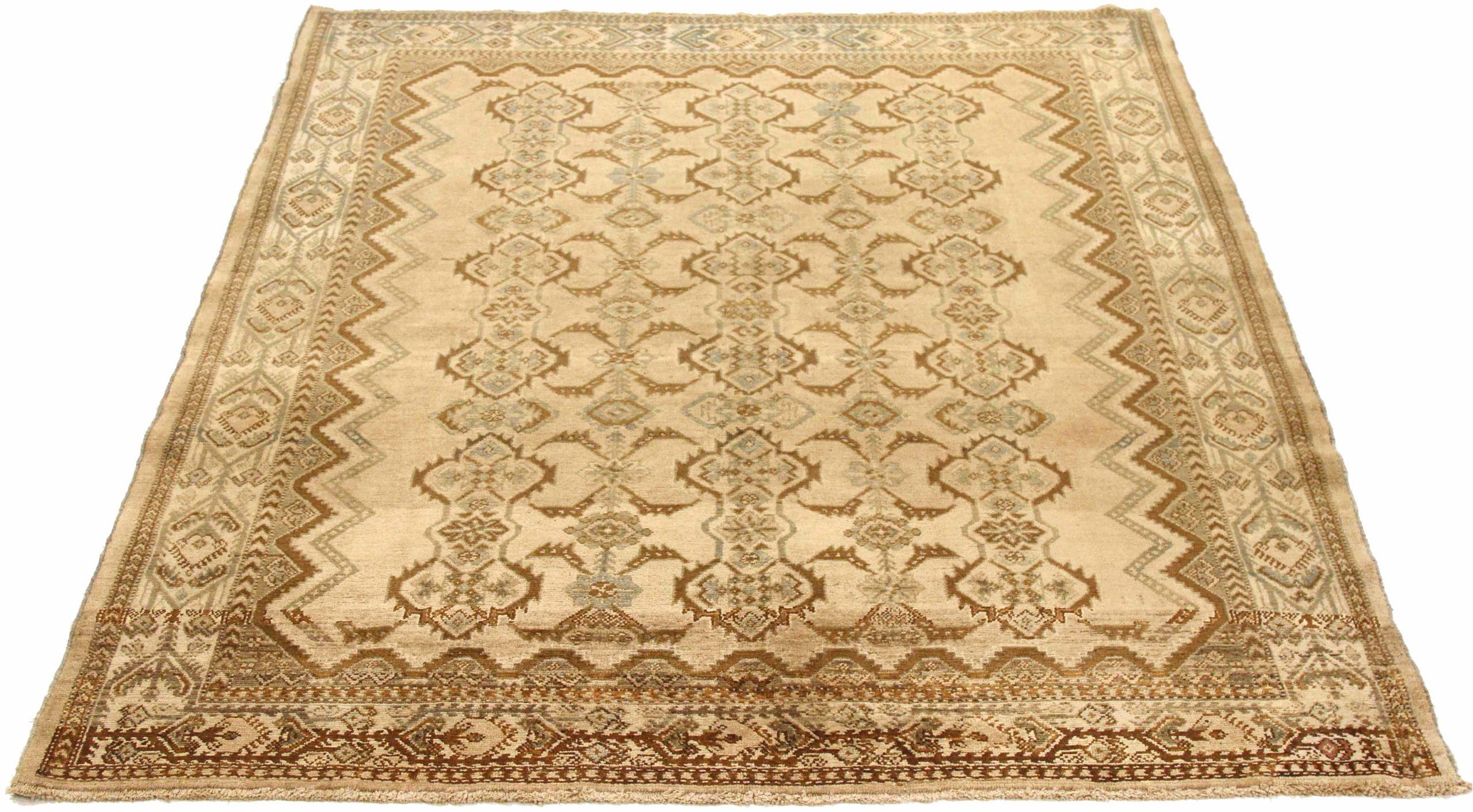 Entdecken Sie die Eleganz des persischen Hamadan mit dem kleinen Teppich von CIRCA 1910. Dieses exklusive Design aus Wolle und BlauBraunElfenbein ist perfekt, um Ihren Raum zu verschönern.