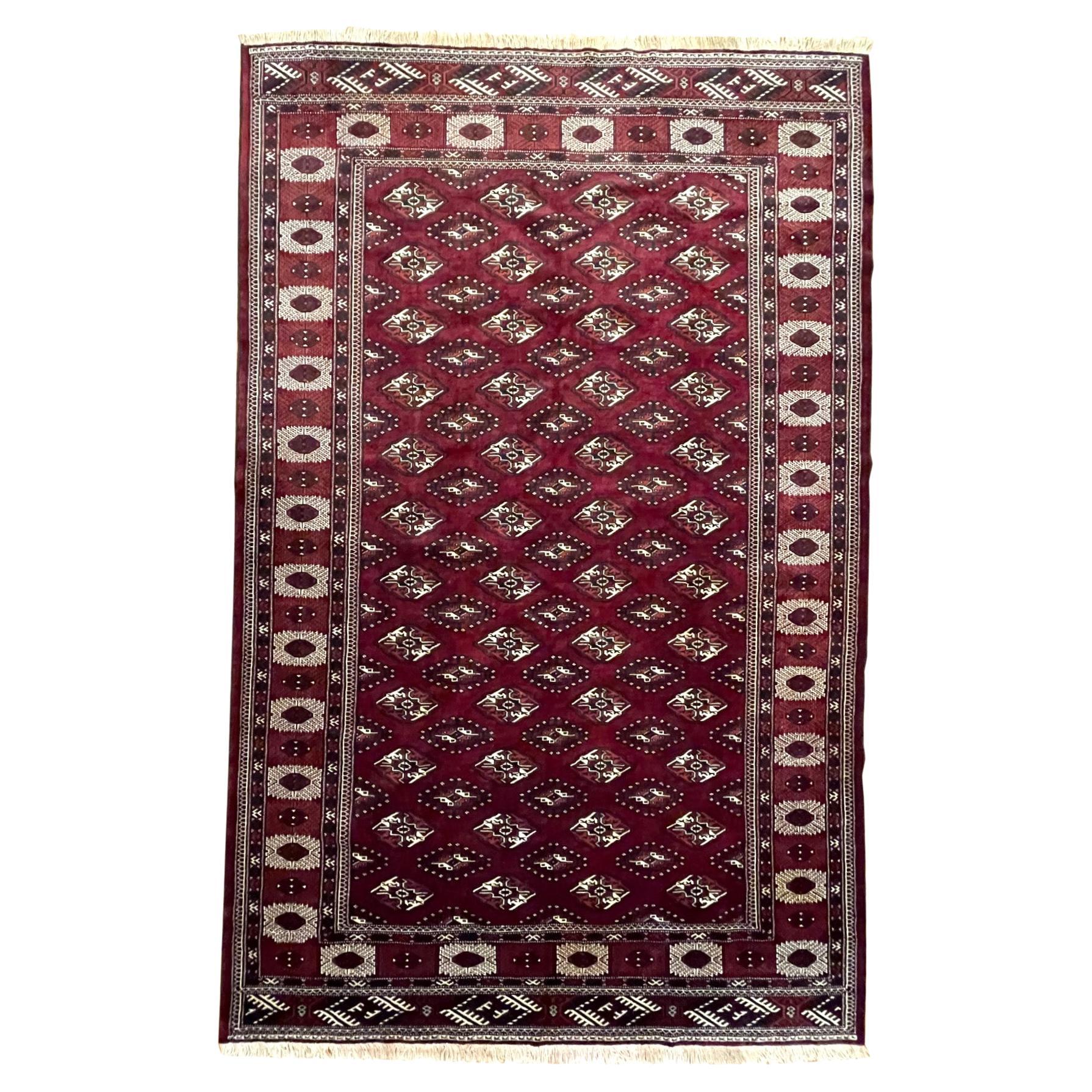 Persian Hand Knotted All Over Elephant Print Medallion Turkmen Rug 1970 Circa For Sale