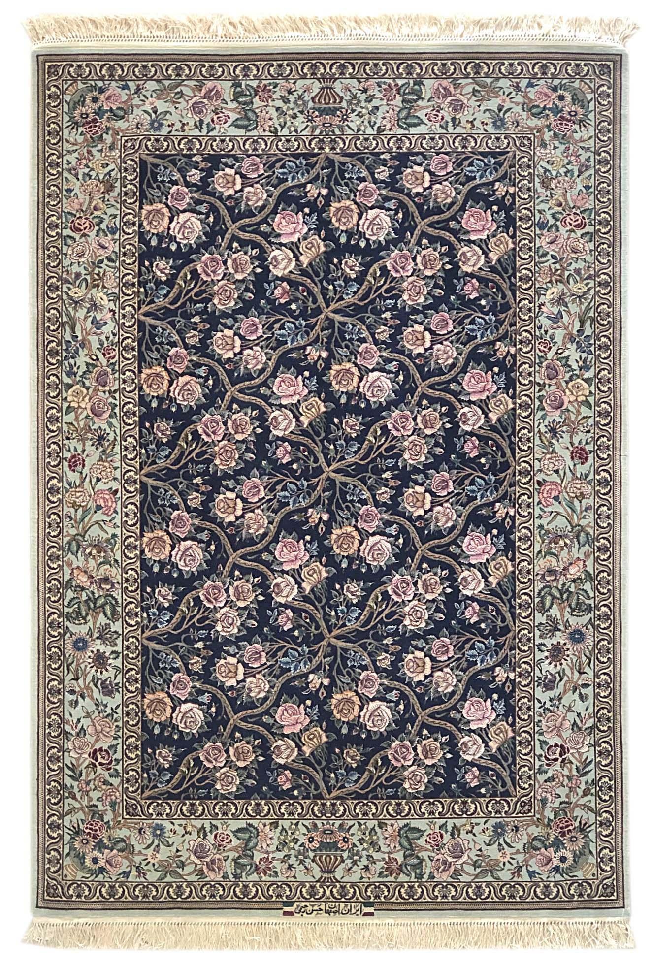 This authentic Persian Isfahan rug has wool and silk pile on silk foundation with an excellent condition. The design and color combination are absolutely magnificent and unique. This rug has signed by Hassan Rahimi who is one of the famous weavers