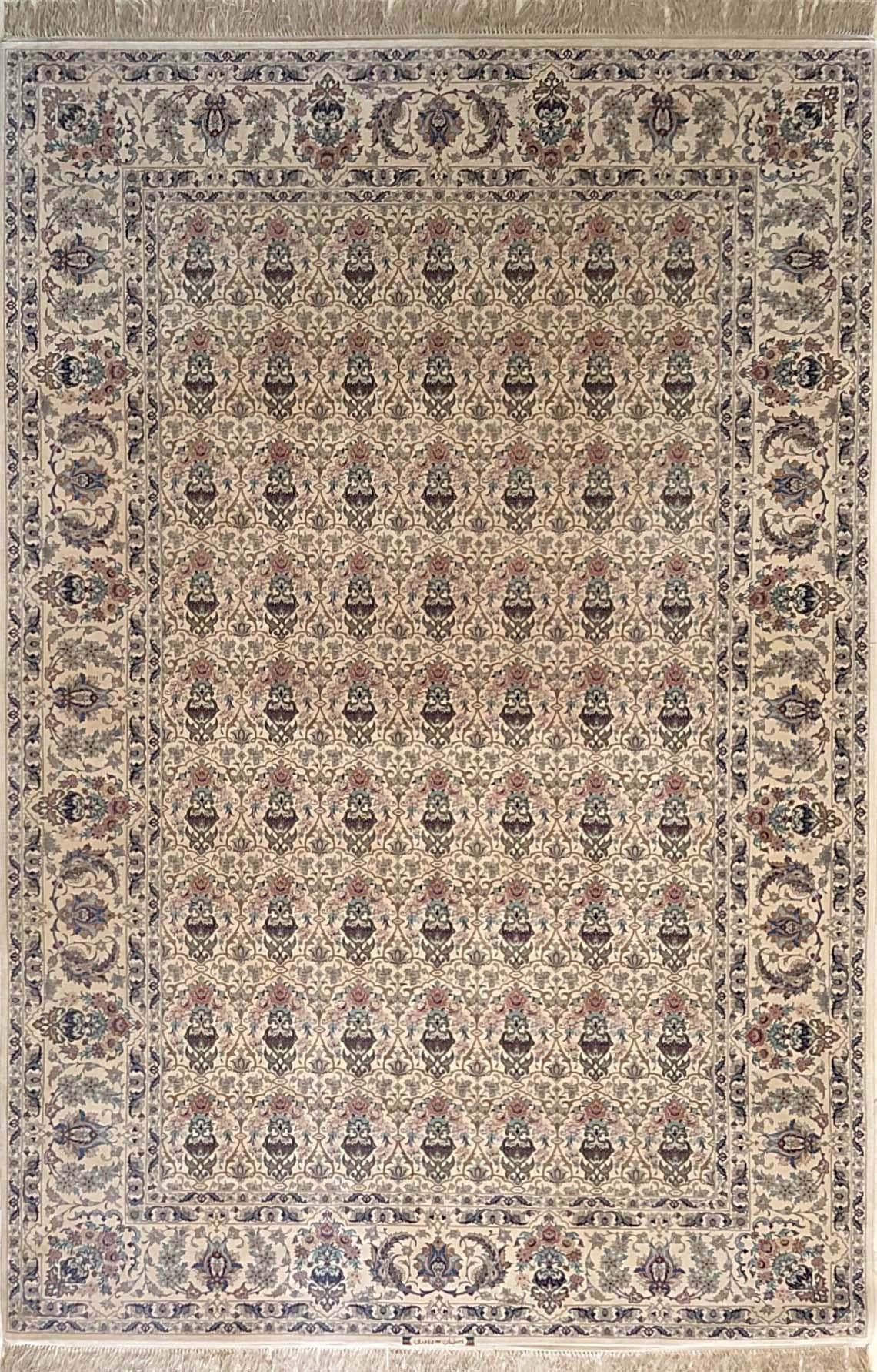 This authentic Persian Isfahan rug has wool and silk pile on silk foundation and has an excellent condition. The color combination in this rug is absolutely outstanding. This Isfahan rug is excellent for decorative purposes, employing soft pastel
