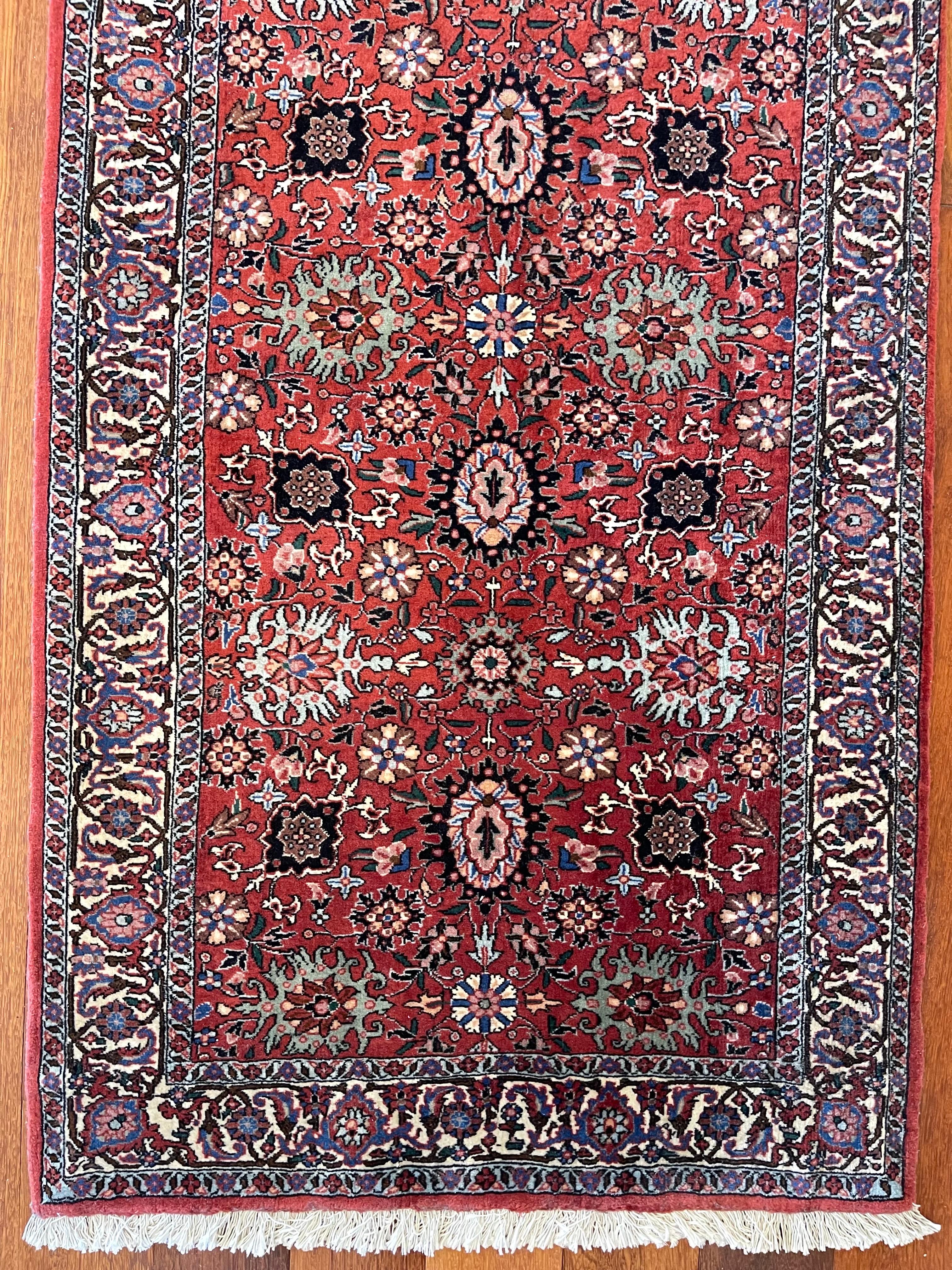 This Authentic beautiful Bijar runner has wool pile and cotton foundation with allover floral (Golafshan) design. It is made using high-quality wool, and the knots are beaten down using a heavy metal comb to give a tight, dirt-resistant pile. This