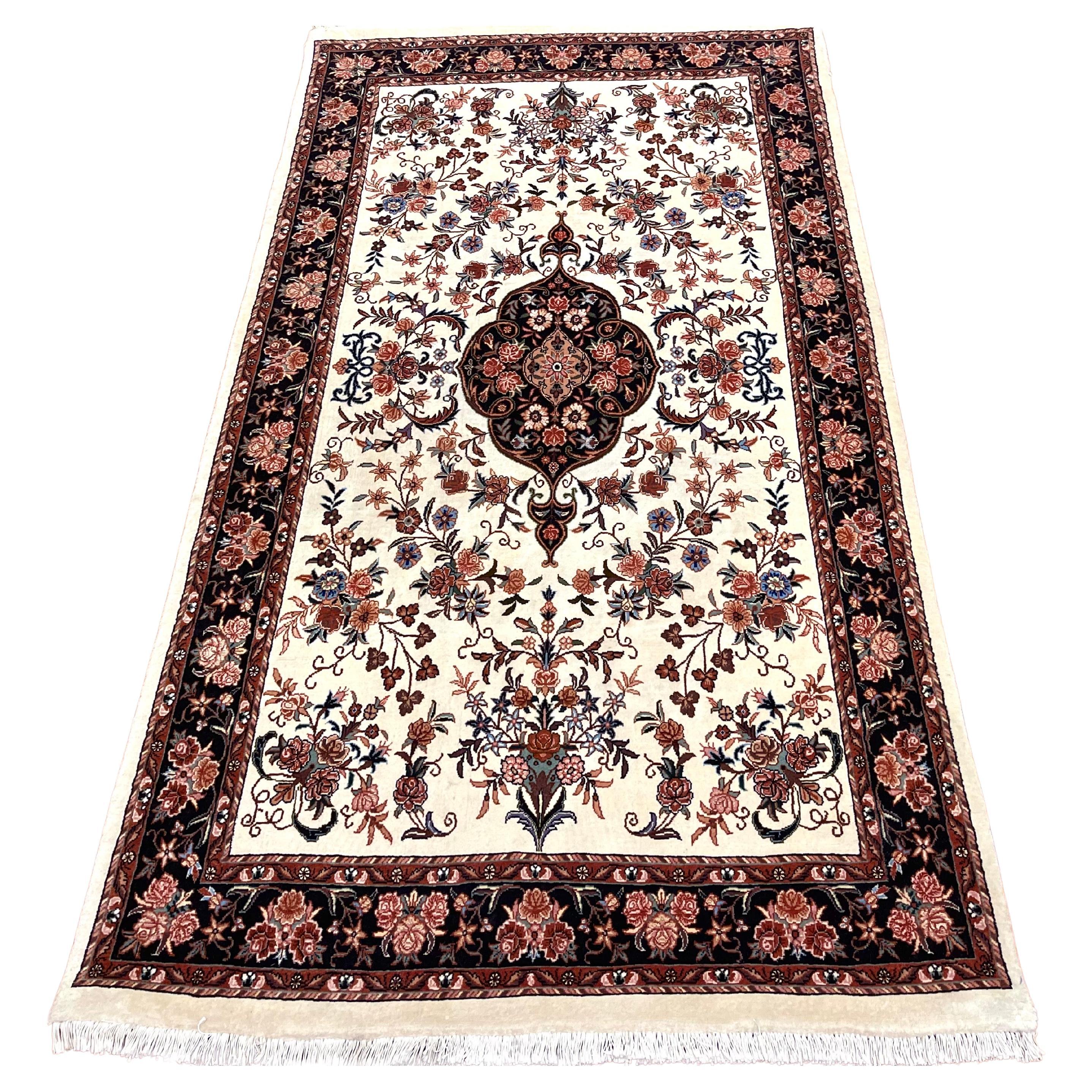 This exquisite piece is a handmade Persian Bijar rug, renowned for its exceptional craftsmanship and intricate design. The rug's pile is a luxurious blend of wool and cotton, offering a soft and lustrous texture, while the foundation is crafted from