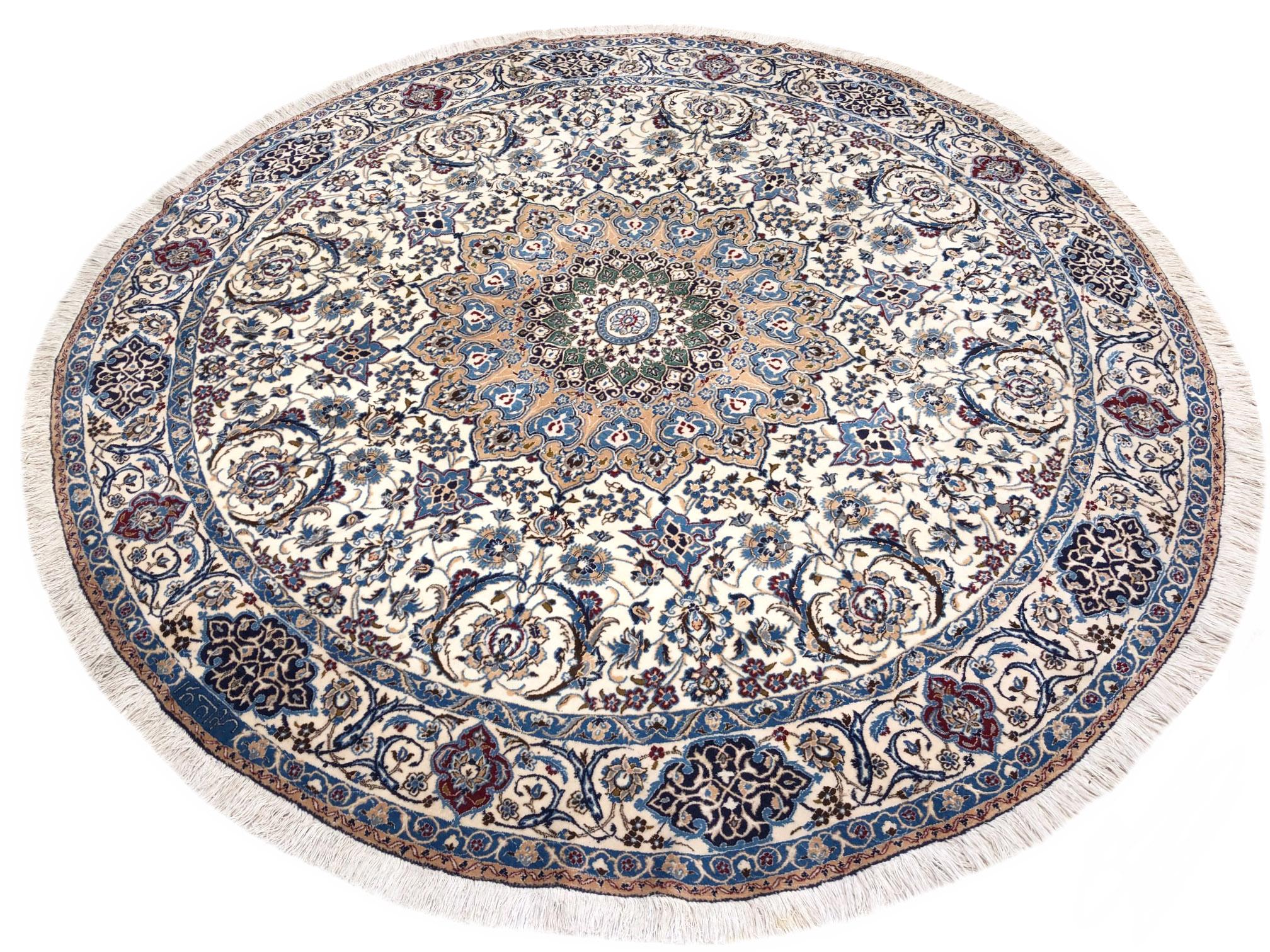 This authentic Persian round hand-made Nain (9 LA) rug has wool and silk pile with cotton foundation. Nain is a city in Iran that is well known for producing fine handmade rug. This rug has medallion floral design. The base and border color is