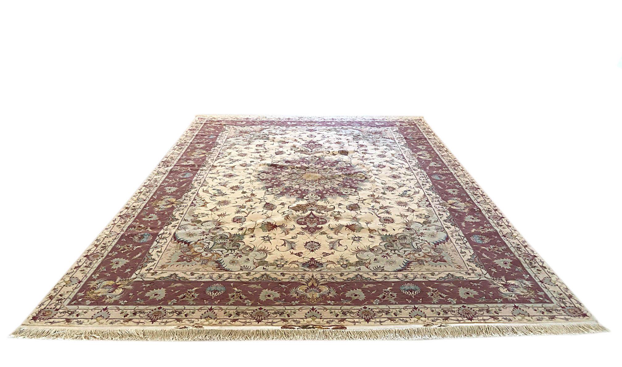 This is a hand knotted Persian Tabriz rug with a floral medallion design. The pile is wool and silk with silk foundation. The size is 8 feet 4 inches wide by feet 11 feet 10 inches tall. This rug is a brand new rug. This beautiful rug features a