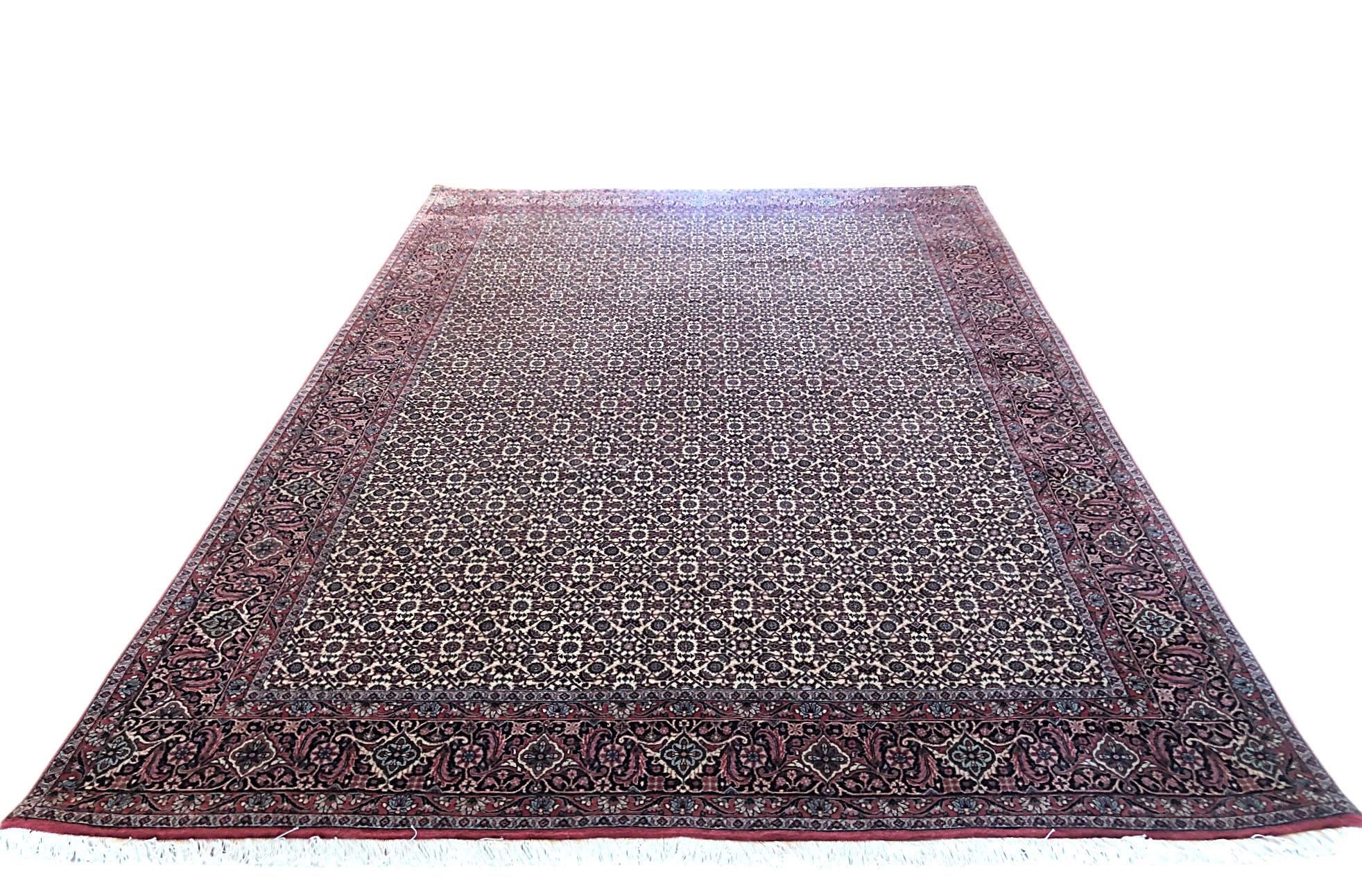 This piece is a handmade Persian Bijar rug. The pile is wool with cotton foundation. This beautiful Persian Bijar rug has all-over Herati design and it is among the most hard wearing rug. It is made using high-quality wool, and the knots are beaten