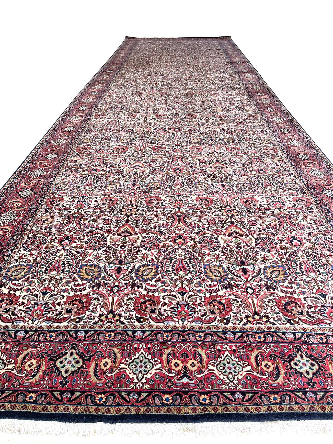 This runner is a handmade Persian rug. The pile is wool & silk with cotton foundation, the pile is incredible dense and strong. This stunning Persian Bijar rug is among the most hardwearing rug. It is made using high-quality wool, and the knots are