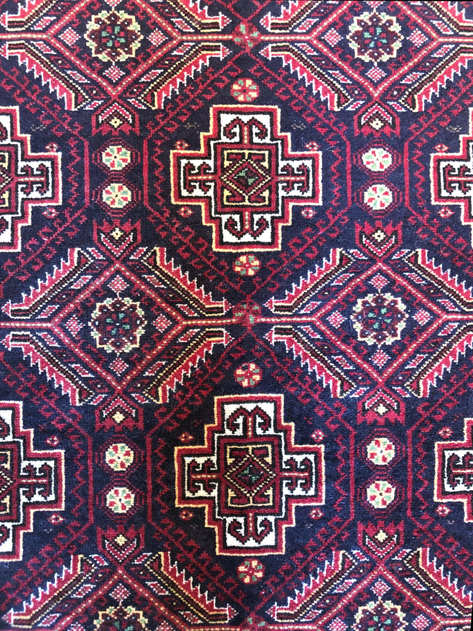 Tribal Persian Hand Knotted Red Black All-Over Baluchi Rug, circa 1960