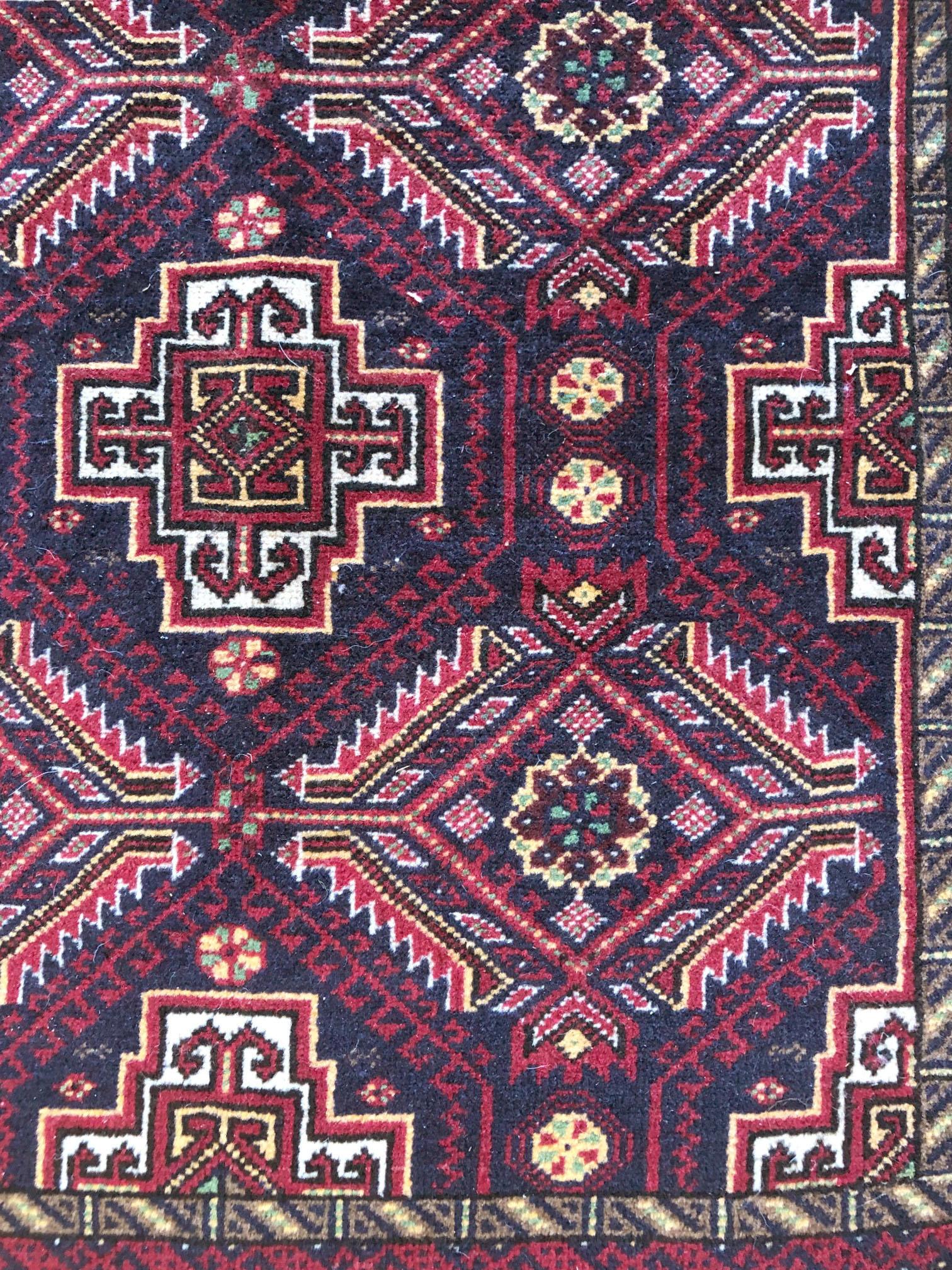 Hand-Knotted Persian Hand Knotted Red Black All-Over Baluchi Rug, circa 1960