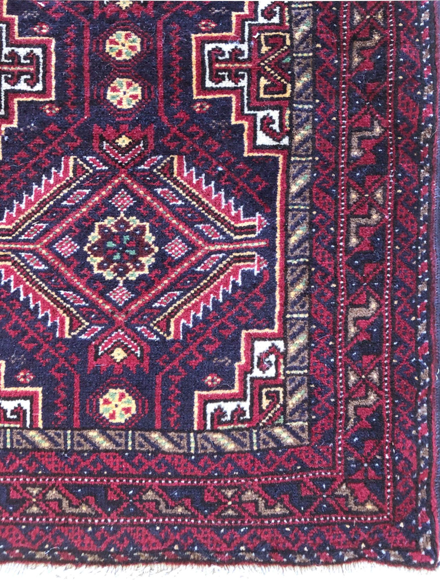 Persian Hand Knotted Red Black All-Over Baluchi Rug, circa 1960 In Good Condition In San Diego, CA